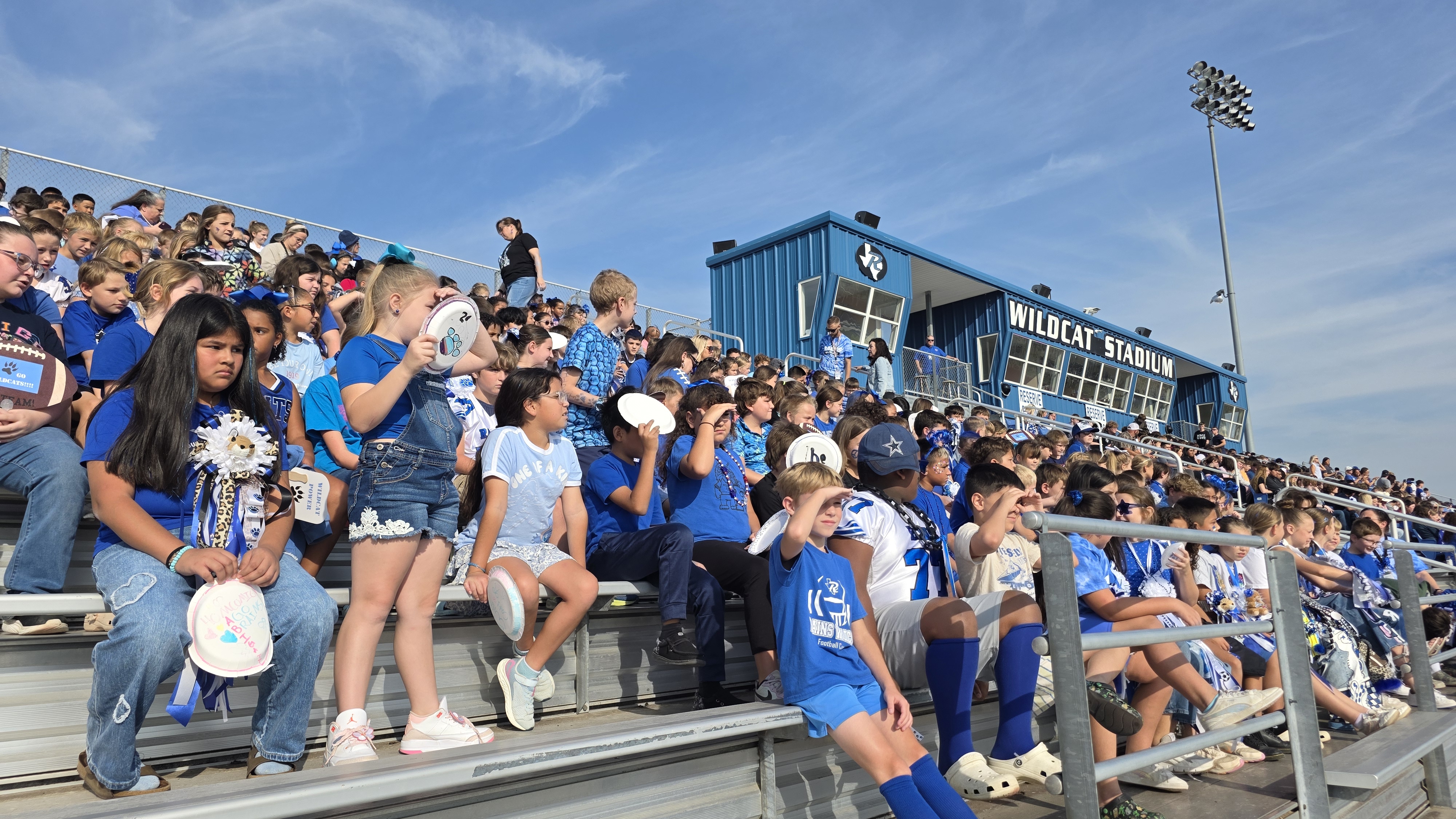 Homecoming Pep-Rally picture of stadium with students filling the seats