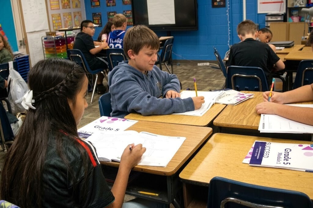 intermediate students working at desks