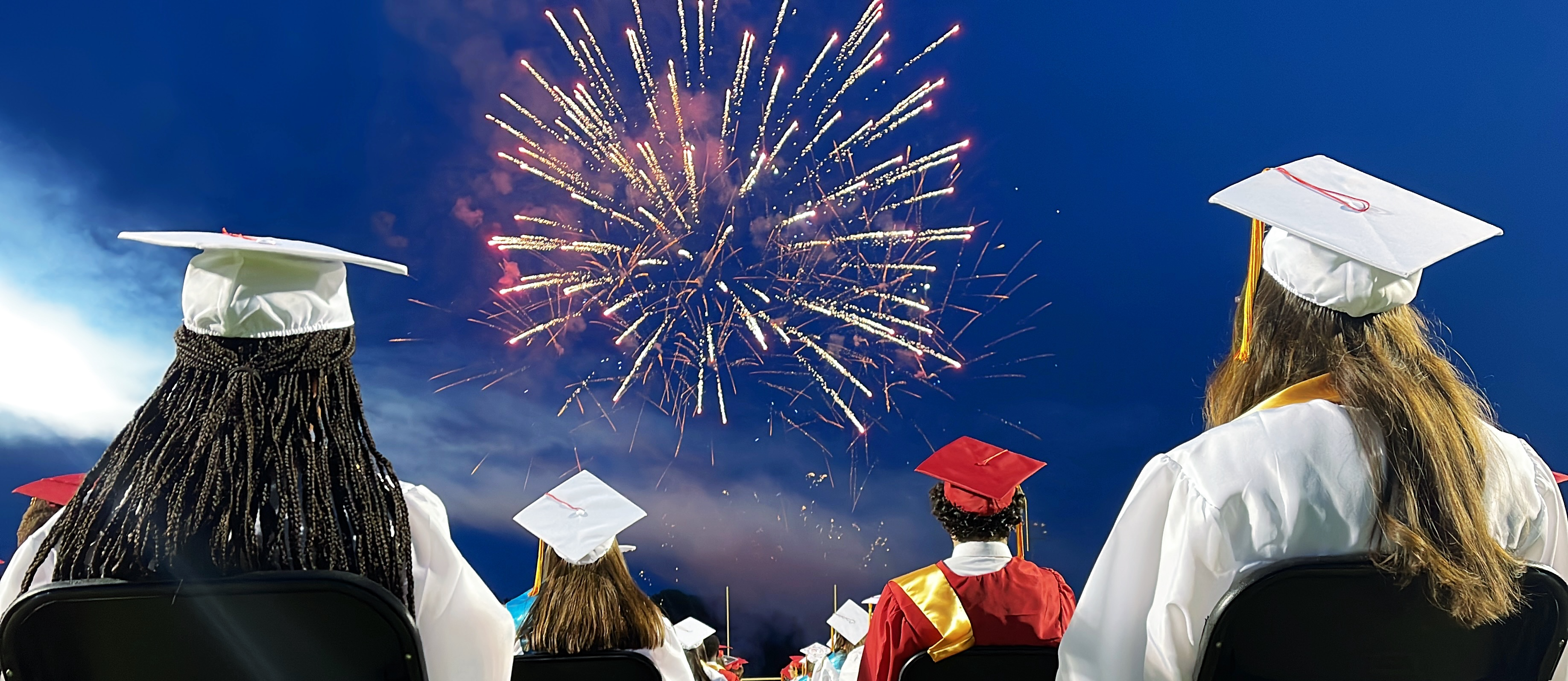Goochland high school graduates watching fireworks at the graduation ceremony 