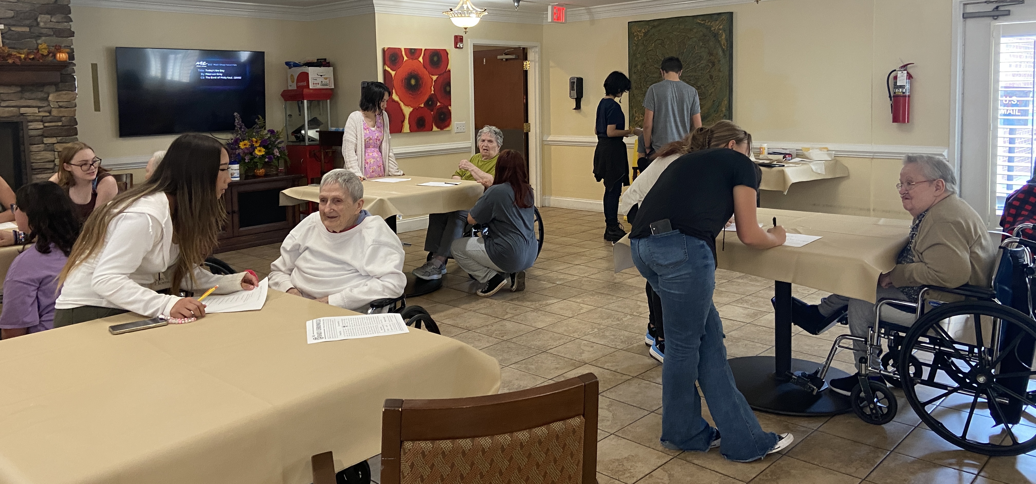 Theater students volunteering at a local nursing home