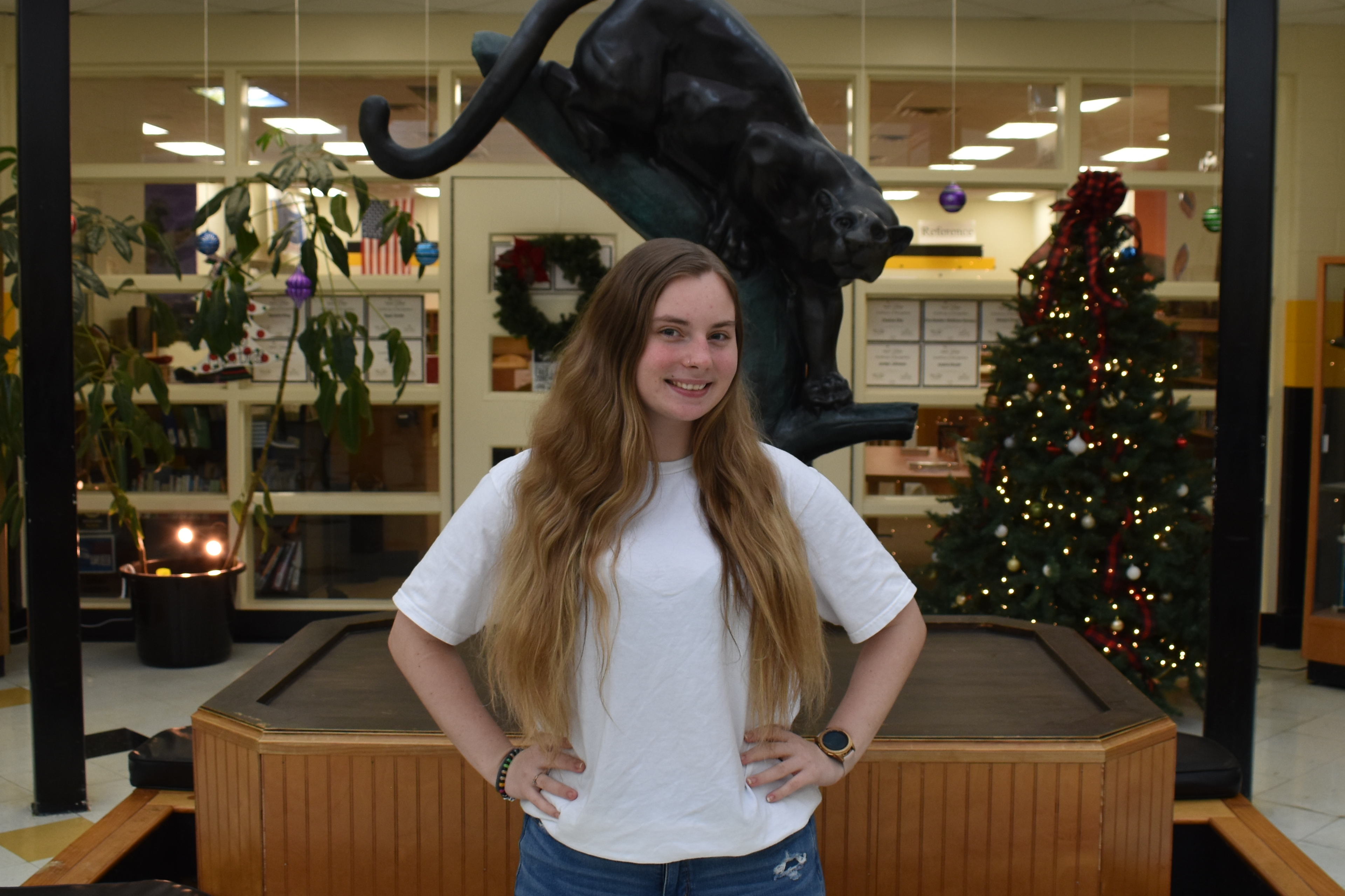 Person standing in front of the panther 