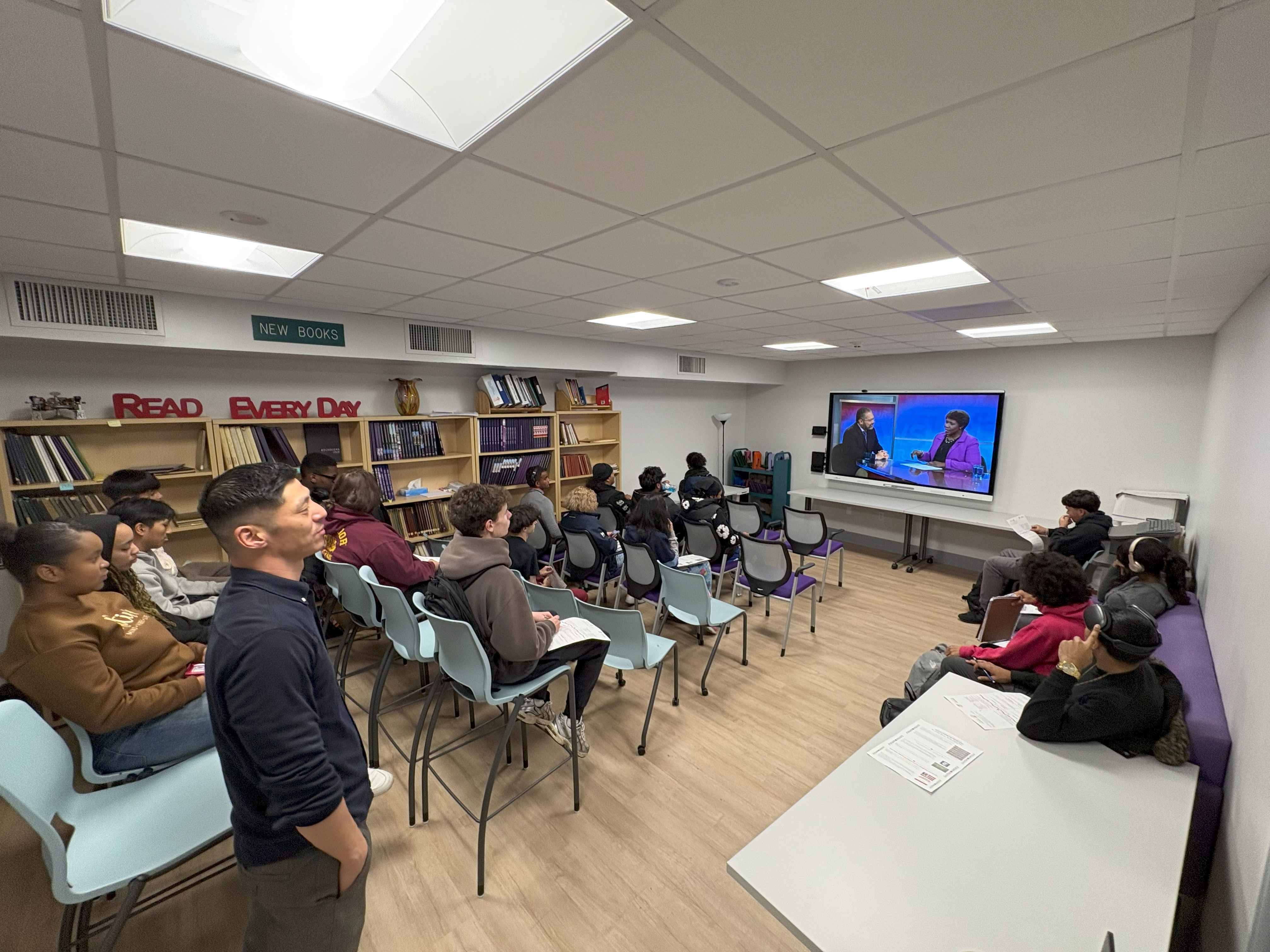 Mr. Nick Crocco (Social Studies) and his class watch a documentary on Hispanic American History in the New Rochelle High School Library Conference Room