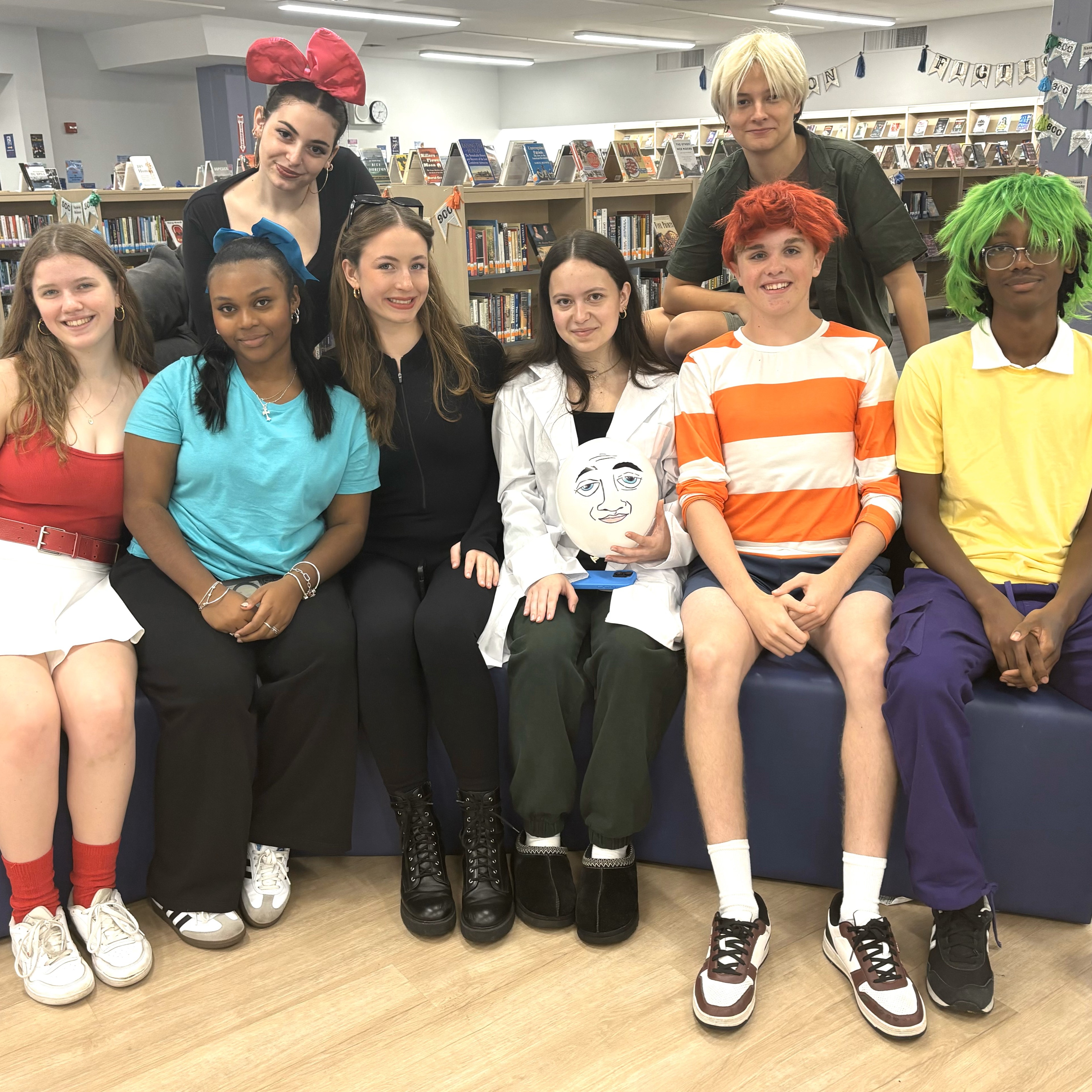 Group of students in various Halloween Costumes