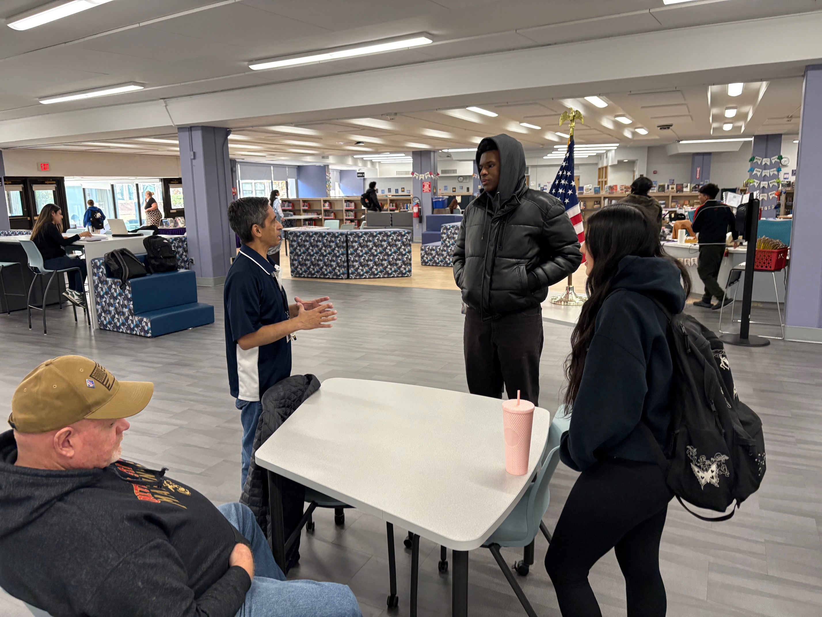 Students speaking with New Rochelle Military Veterans for Veterans Day