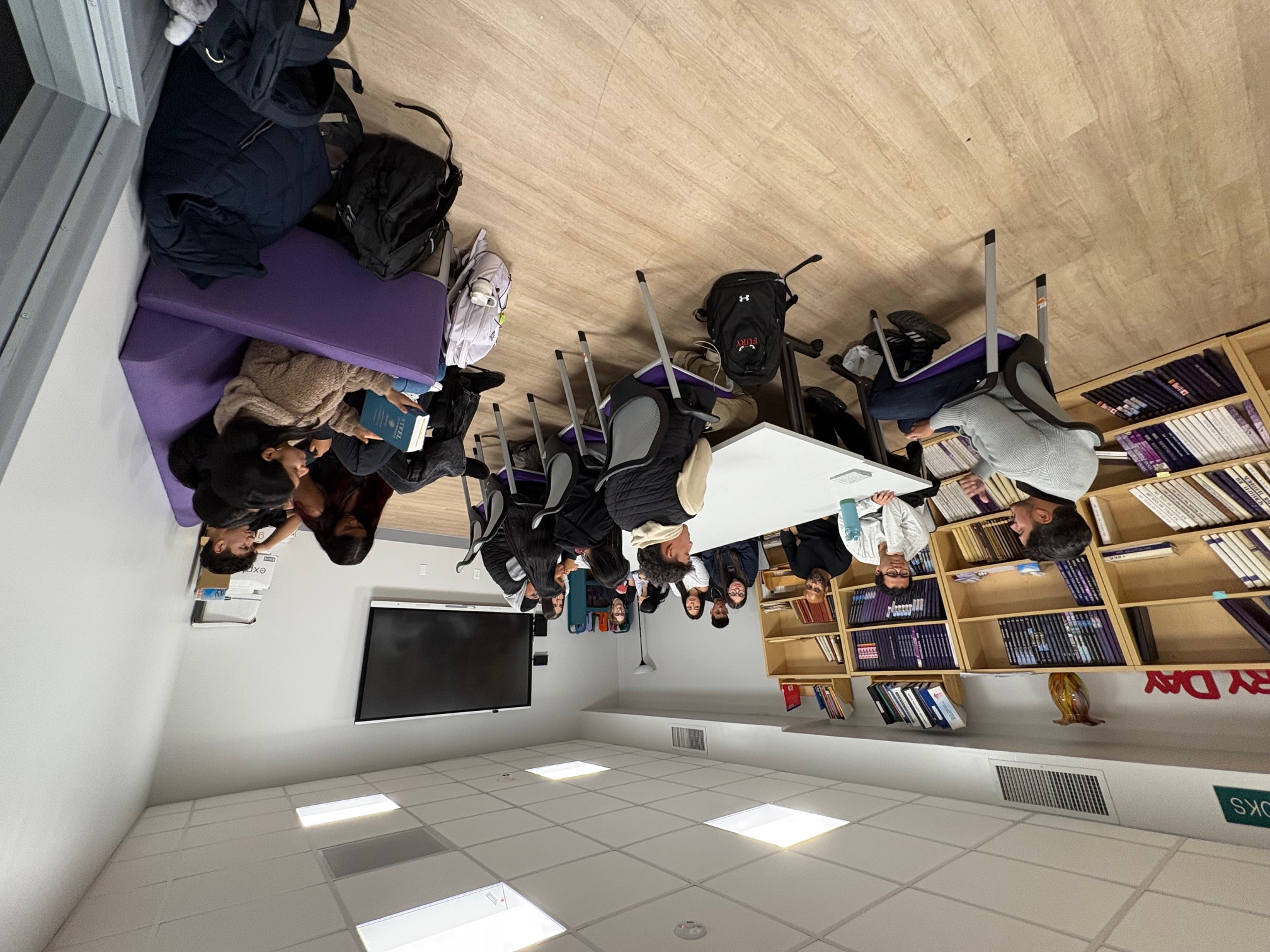 Students  listening to a speaker in the NRHS Library Meeting Room