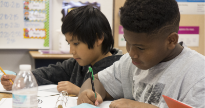 2 fifth grade boys writing