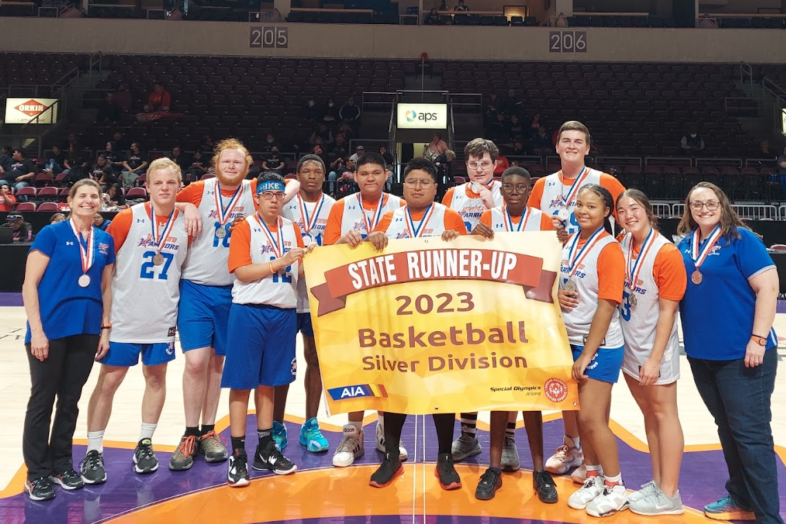 Westwood Basketball team holding banner State runner-up 2023 basketball silver division