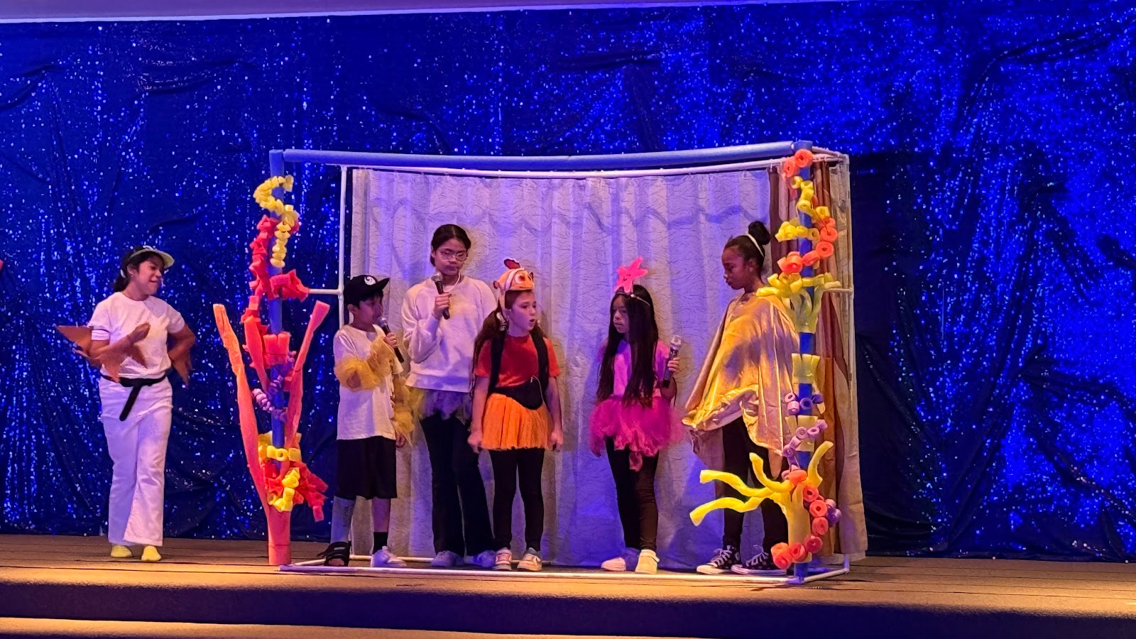 six stuldents participaing in a performance