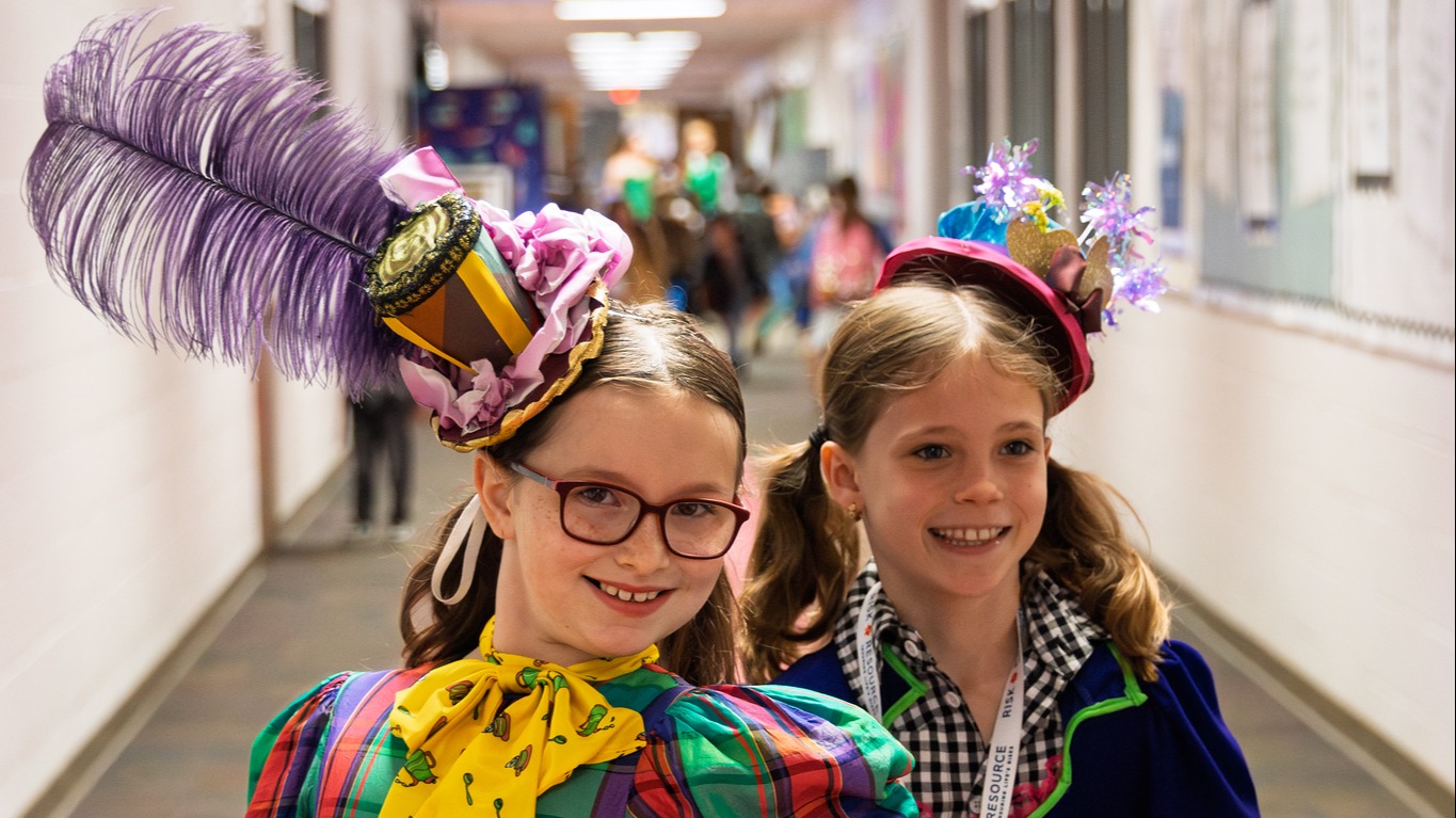 two students dressed for a play