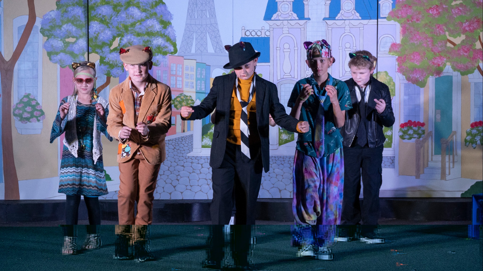 four student performing the Aristrocats at Highland Elementary