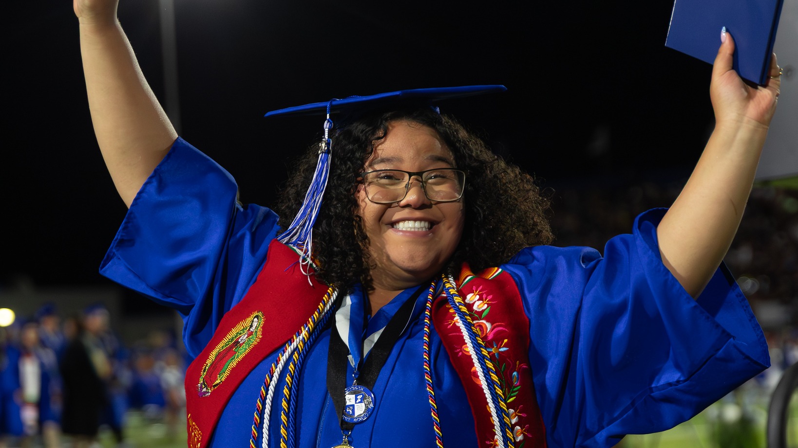 Student gradluating from Dobson HS
