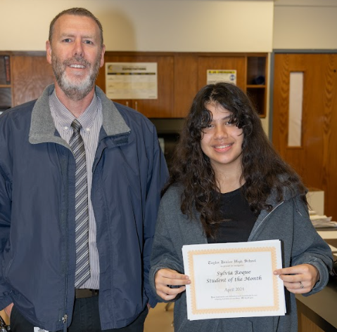 Sylvia Roque student of the month with Principal Jeremy Arnett