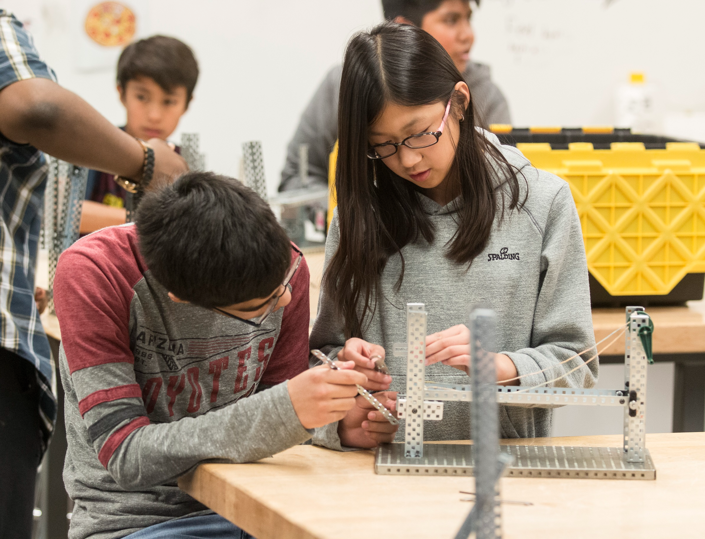 Jr. high students building something