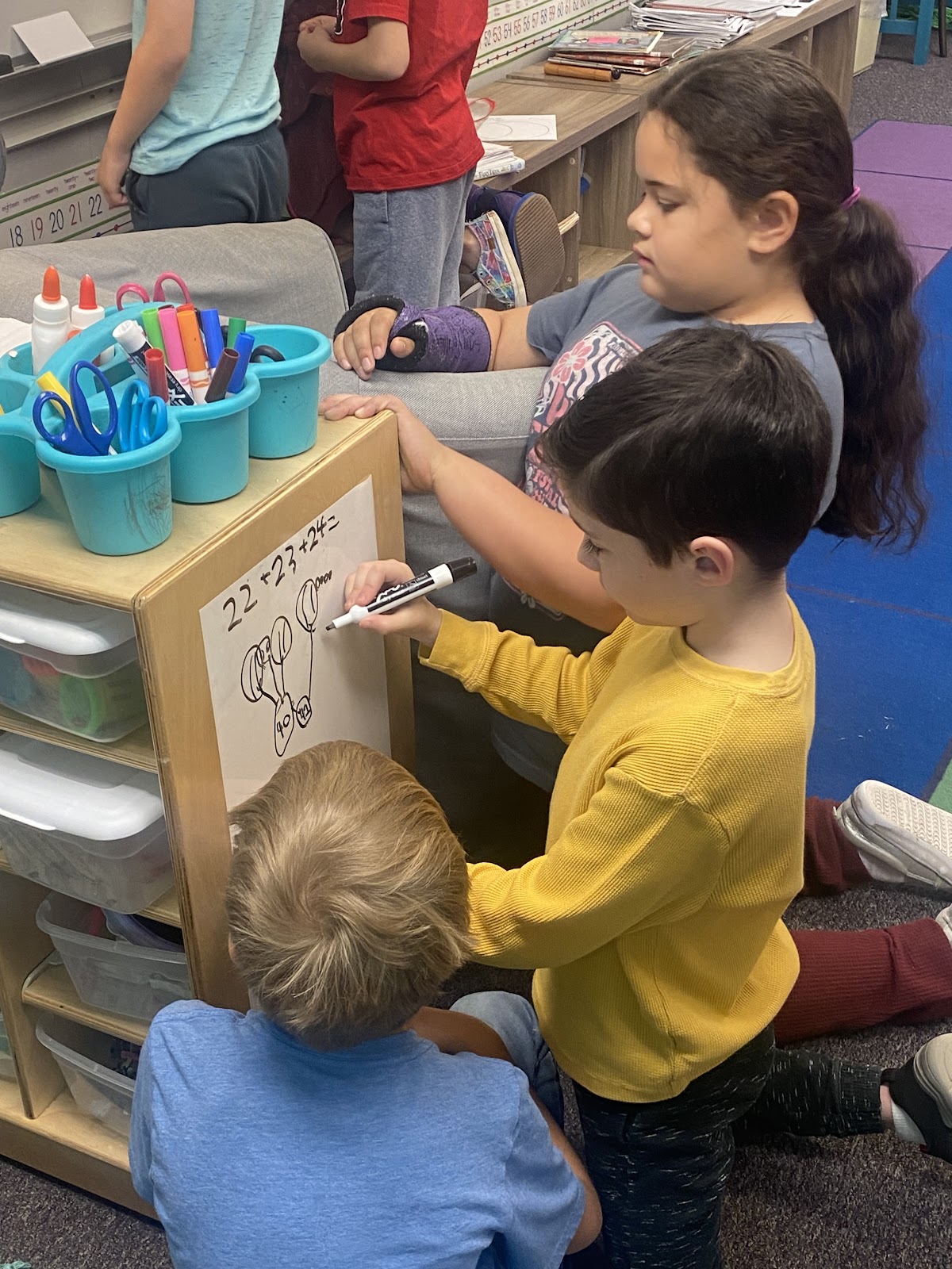 students working together in a classroom