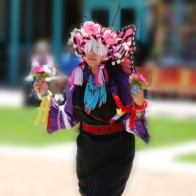 teen girl performing Native American dance