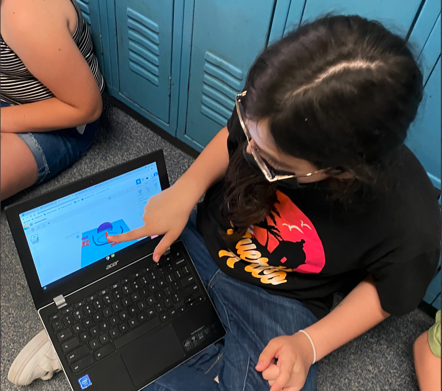 Student demonstrating learning on her Chromebook