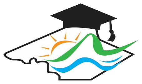 Nicholas County Schools logo featuring the outline of the state of West Virginia in white with a black border. A black graduation cap sits on top of the state outline. Across the center of the logo, a stylized orange sun rises behind flowing green and blue waves that stretch from left to right. The design symbolizes education, growth, and opportunity, using colors that represent the natural beauty of West Virginia.