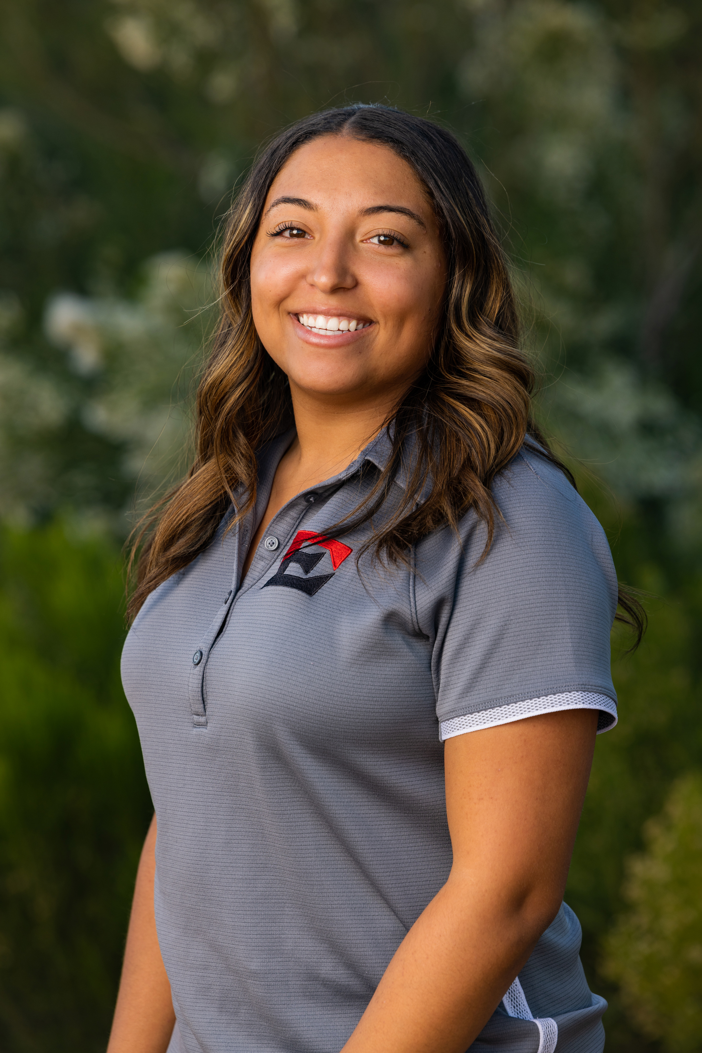 Cheer coach, Dominique Lewis