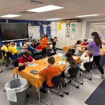 students sitting at desk in classroom