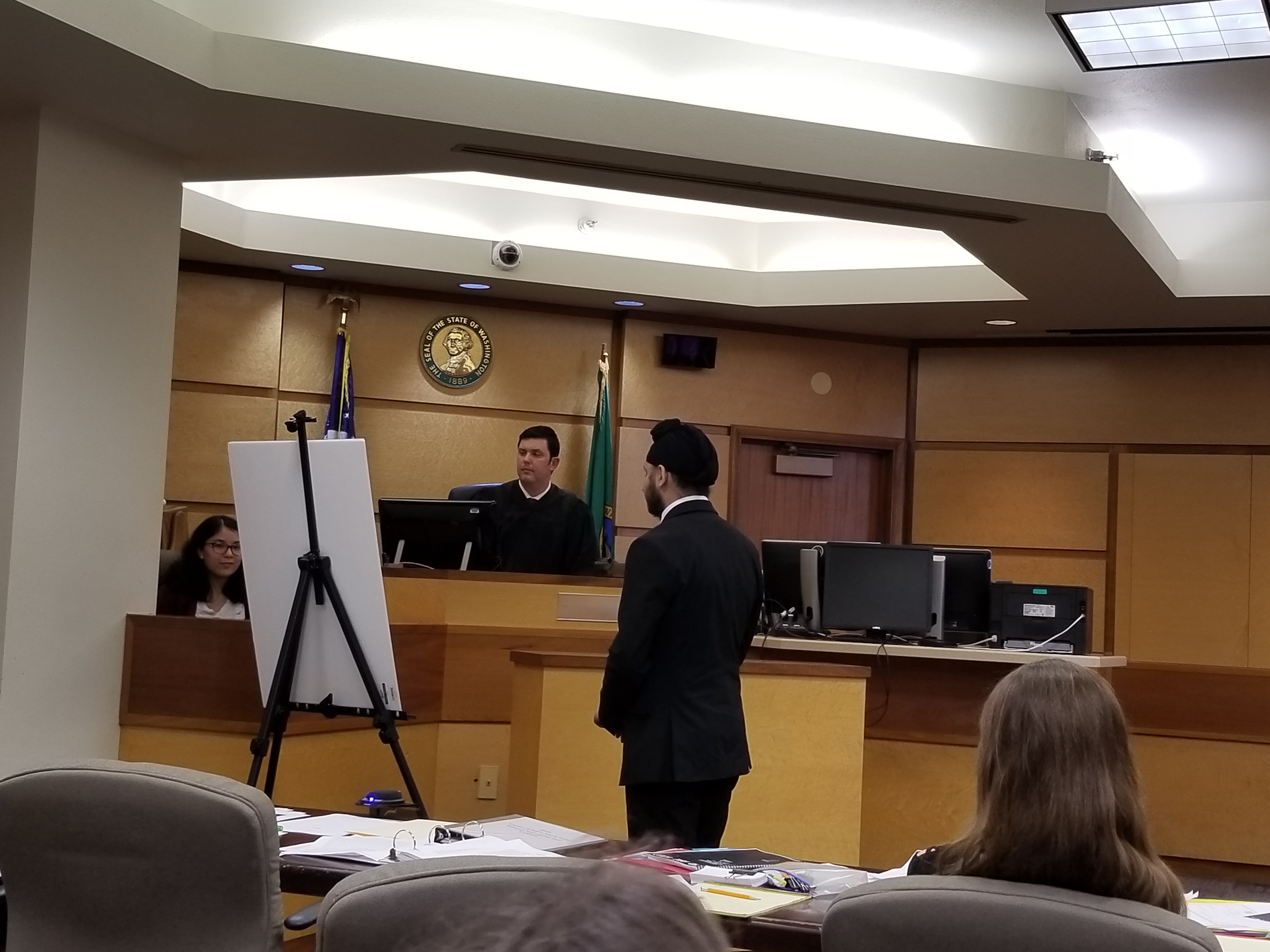 A photo of a group of students in a mock trial