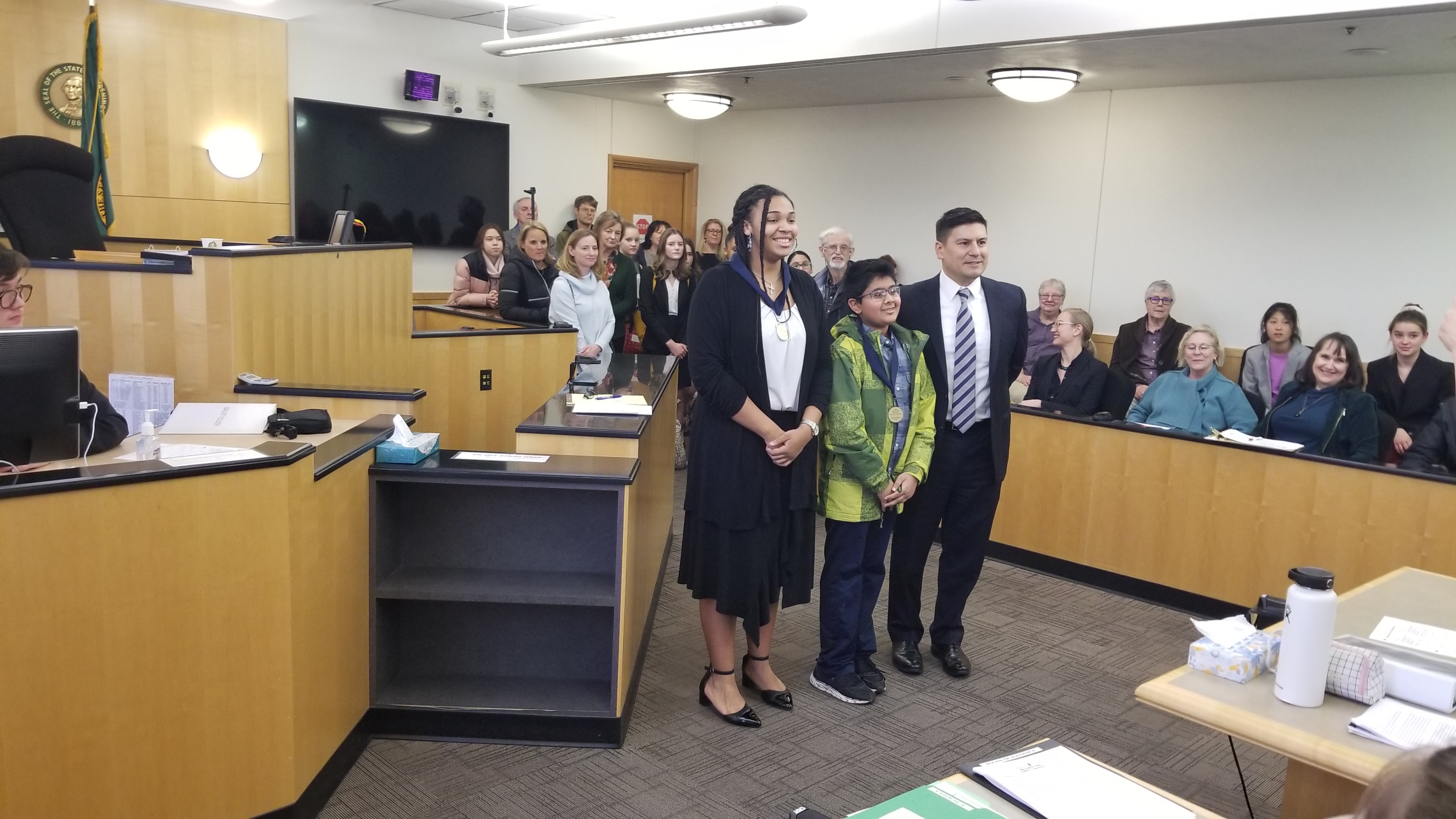 A photo of a group of students in a mock trial