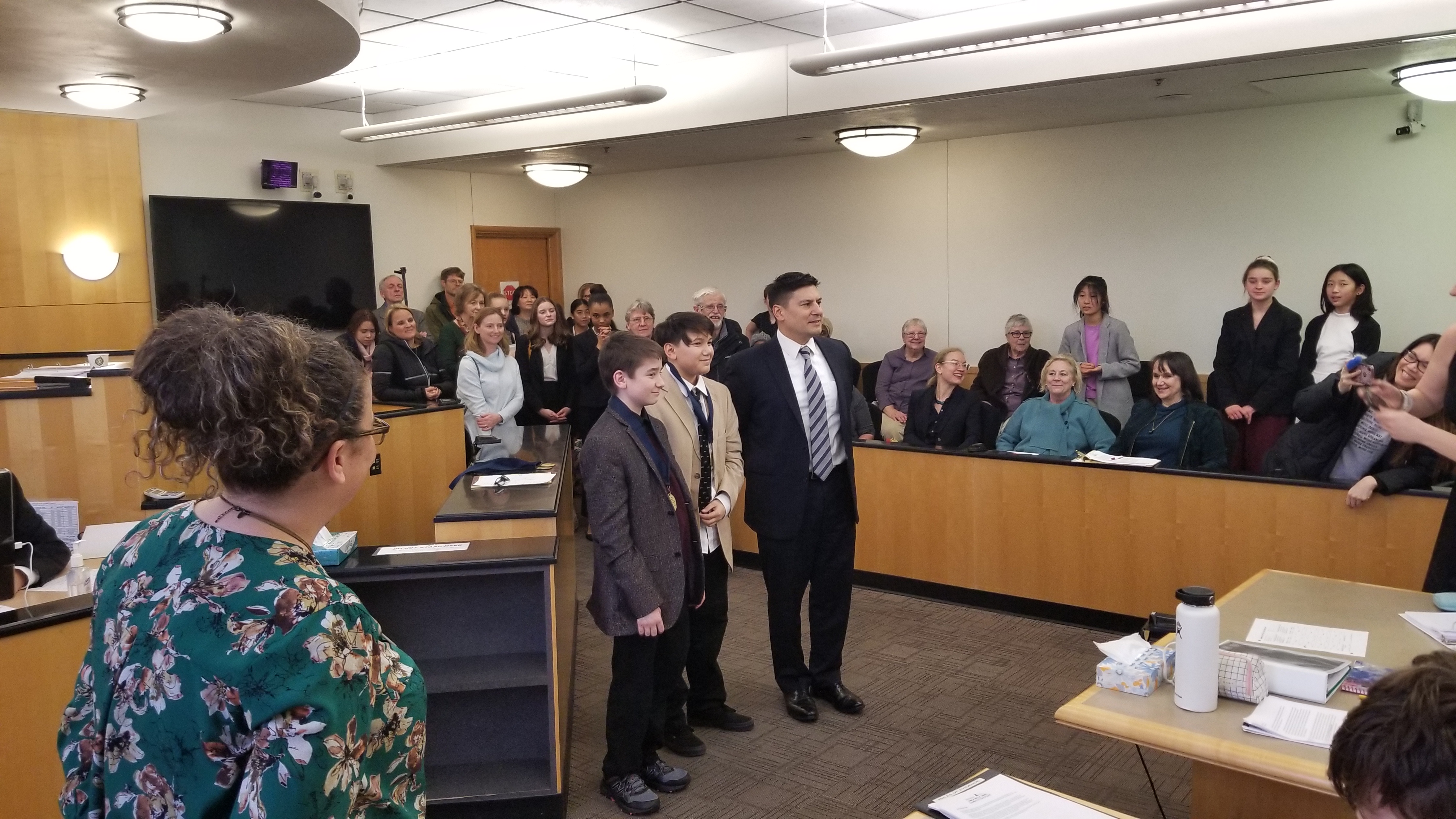 A photo of a group of students in a mock trial