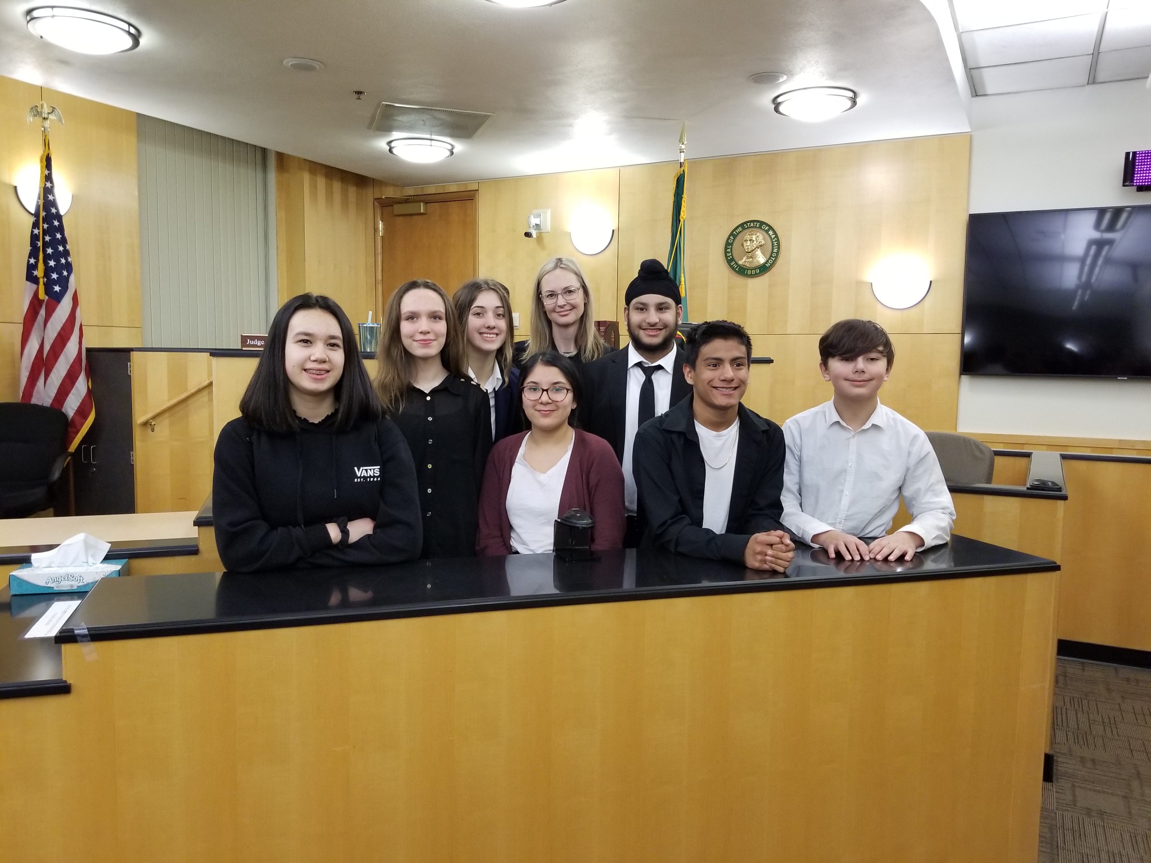 A photo of a group of students in a mock trial