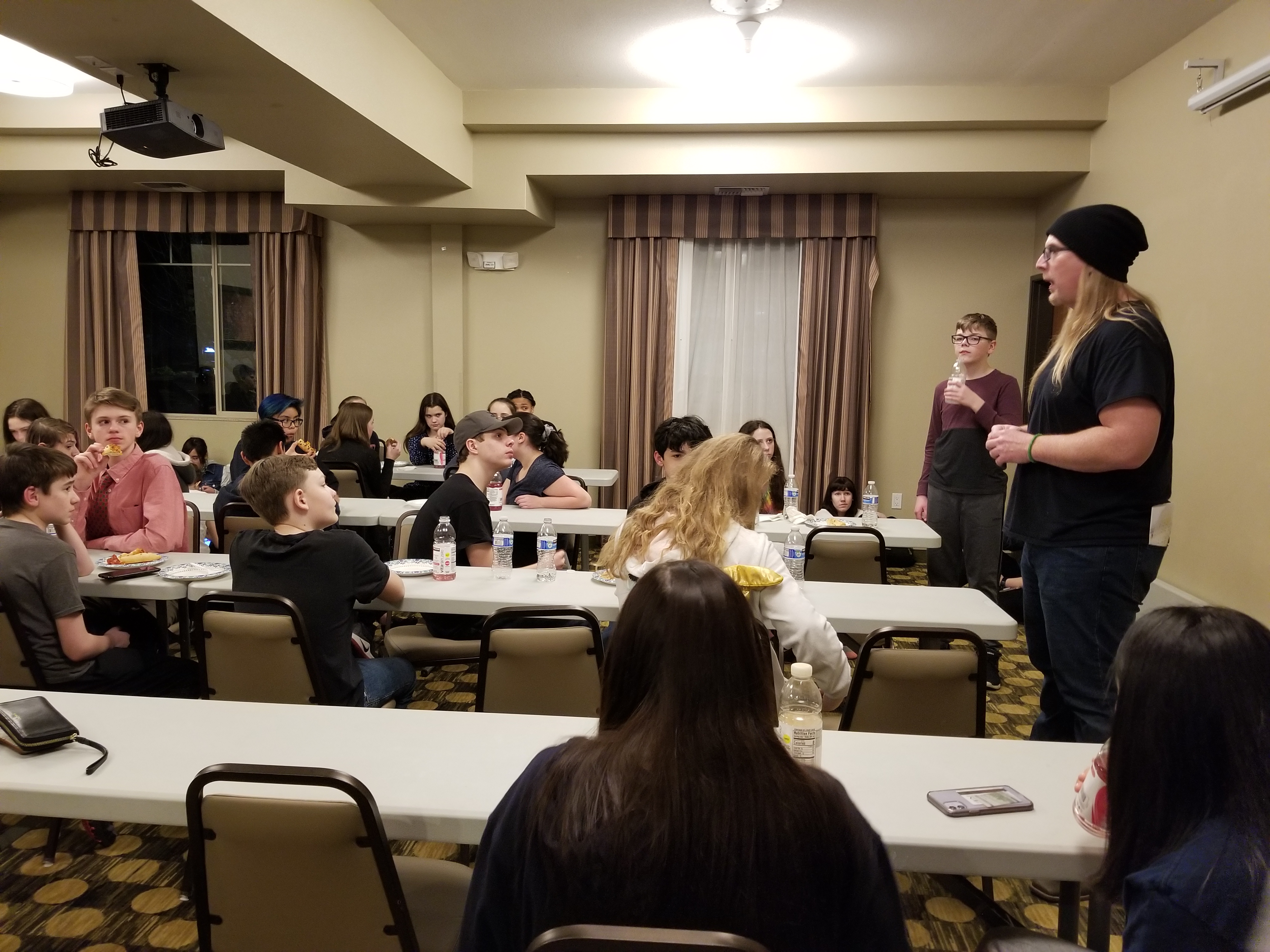 A photo of a group of students in a mock trial