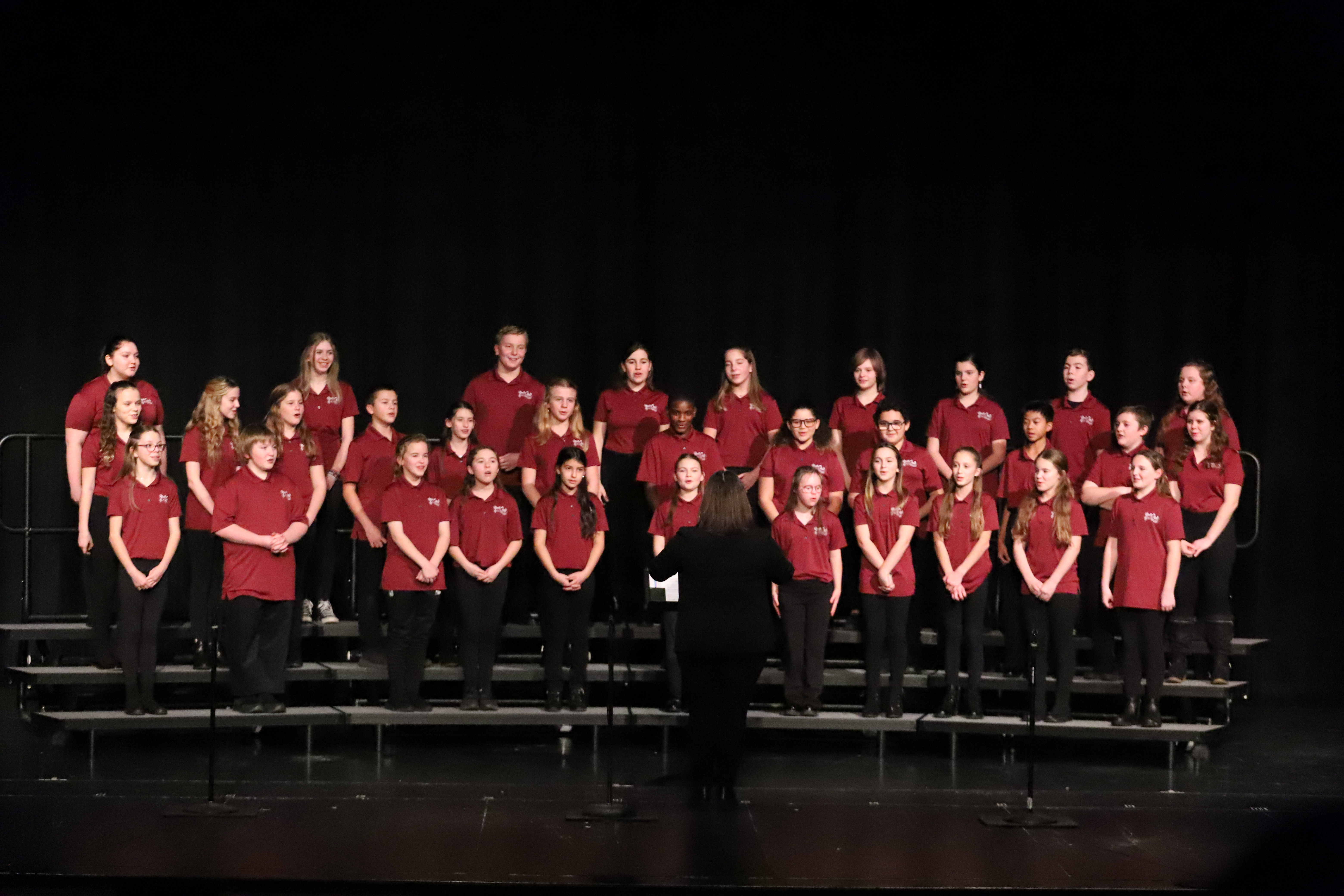 Group photos of student choral music performances