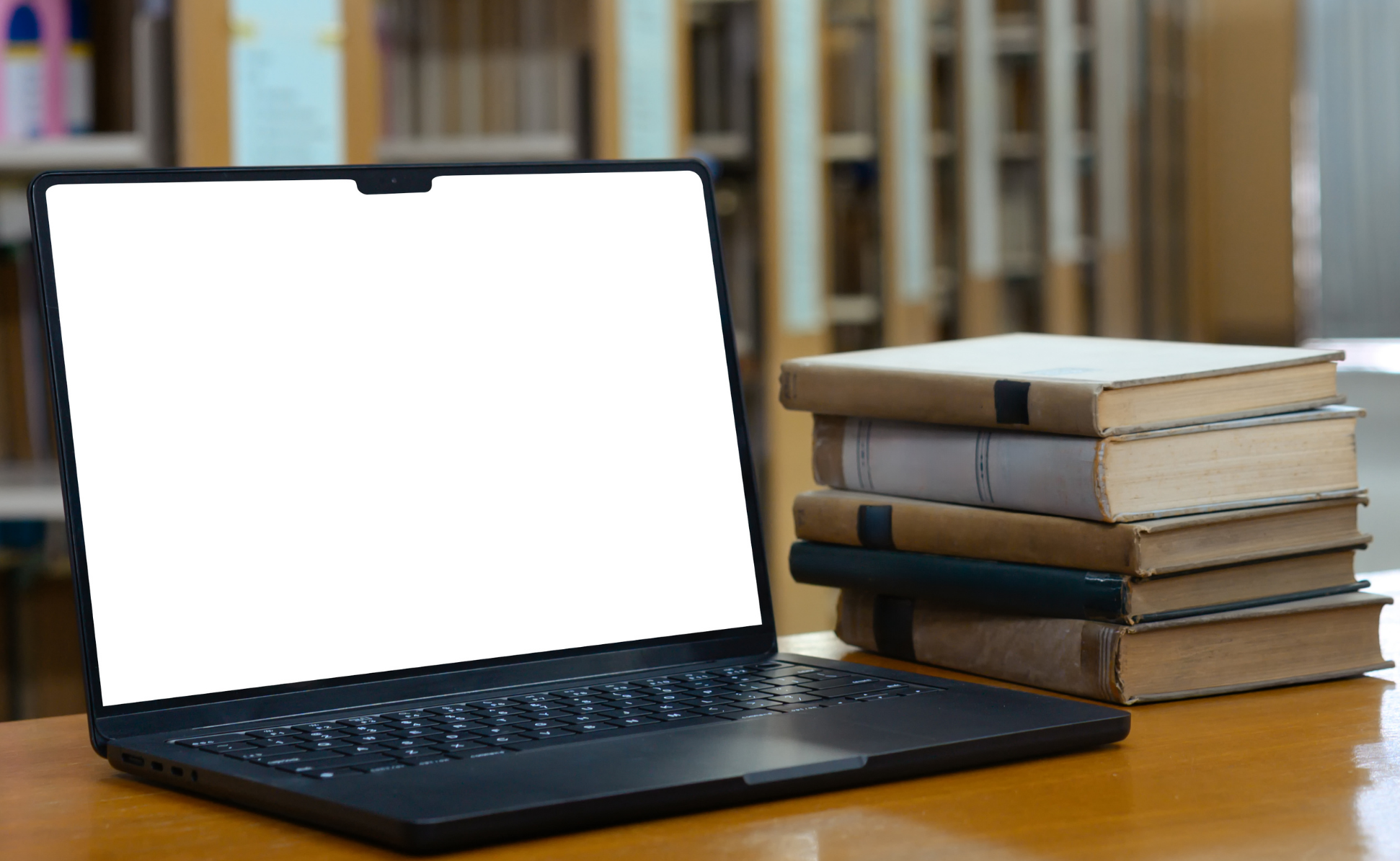 generic image of books and laptop