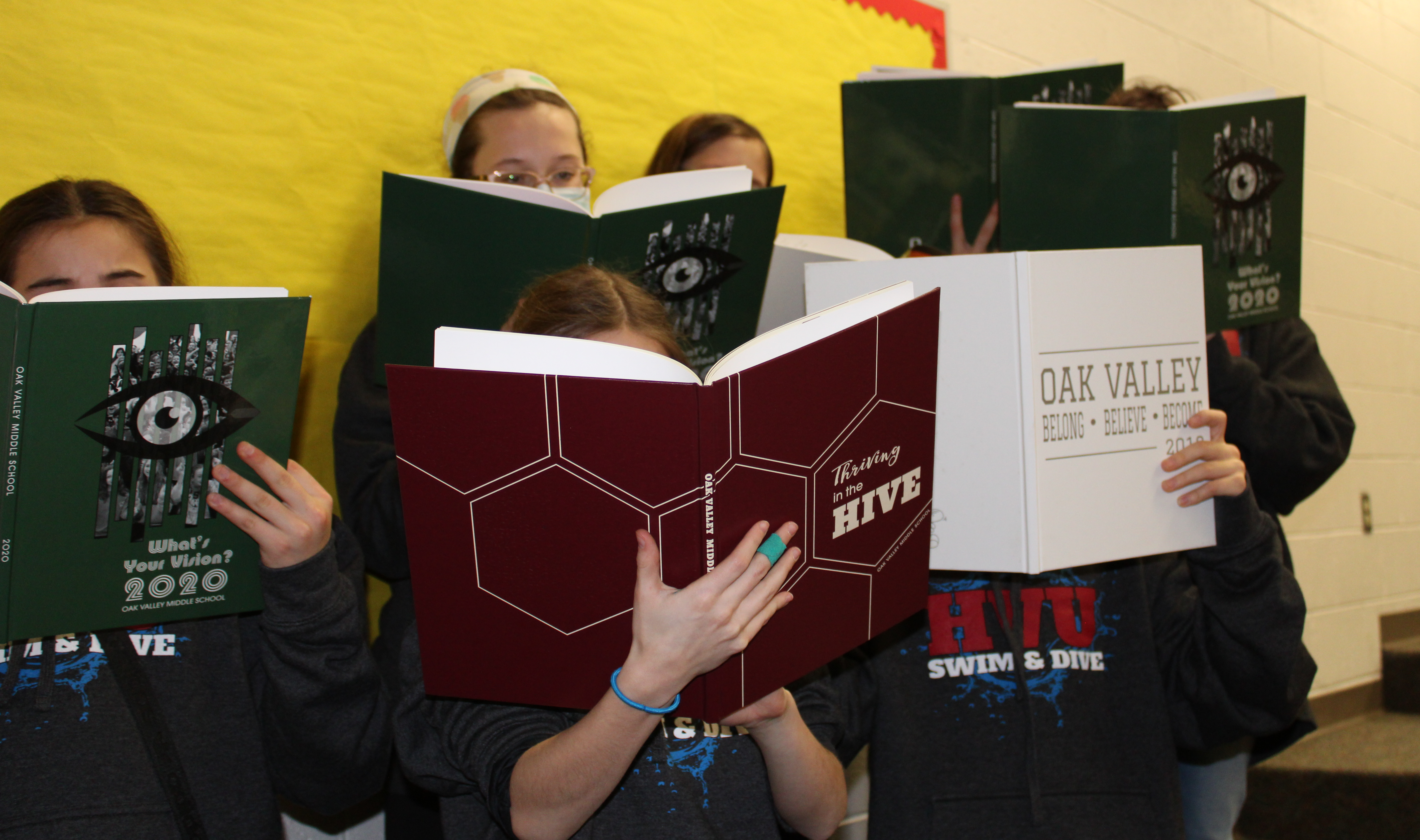 Students looking at yearbooks