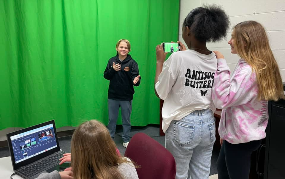 Communication Arts students filming a broadcast