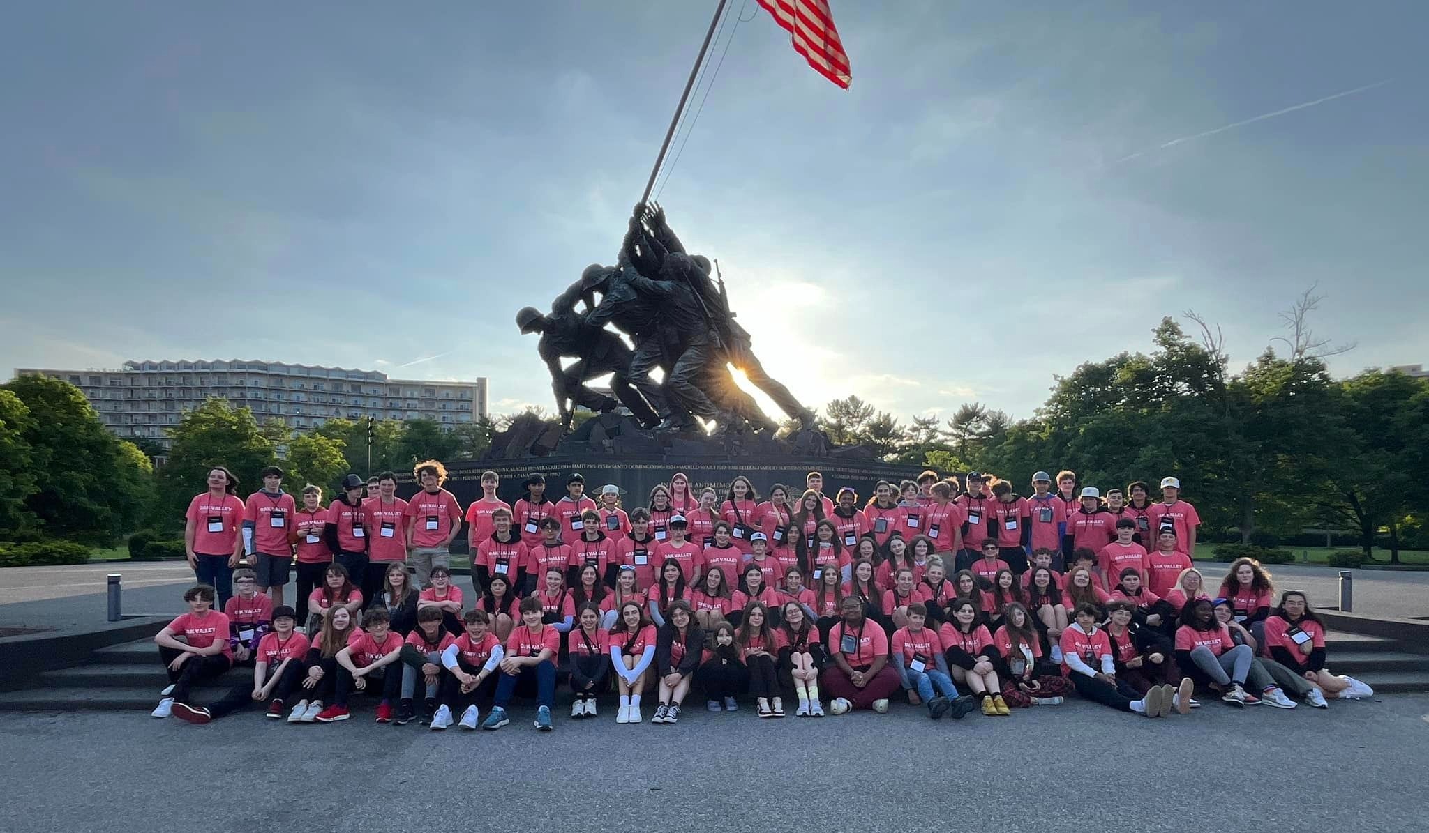 group of students pose in front of Iwo Jima memorial