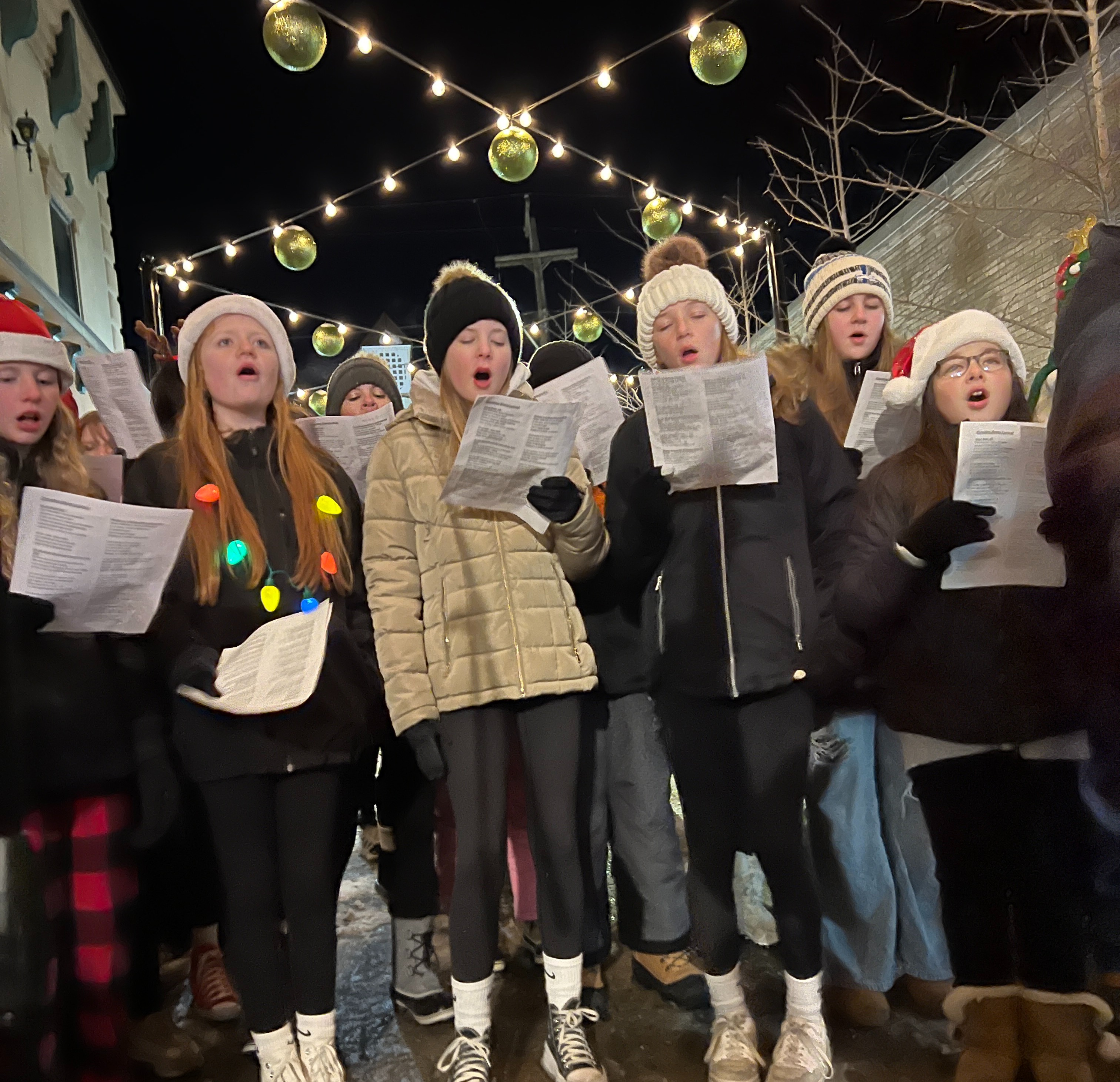 choir sings Christmas carols in town