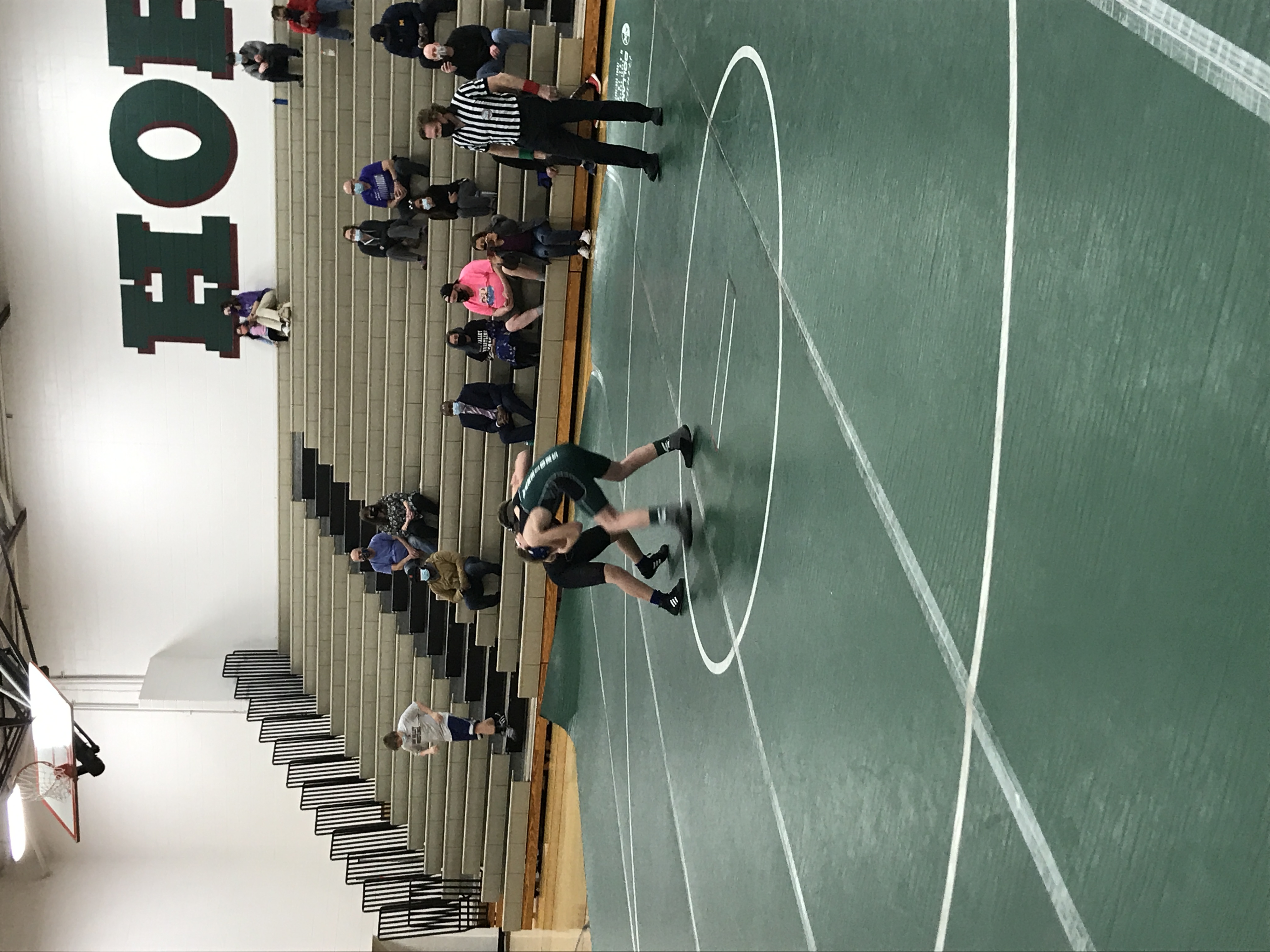 wrestlers on the mat