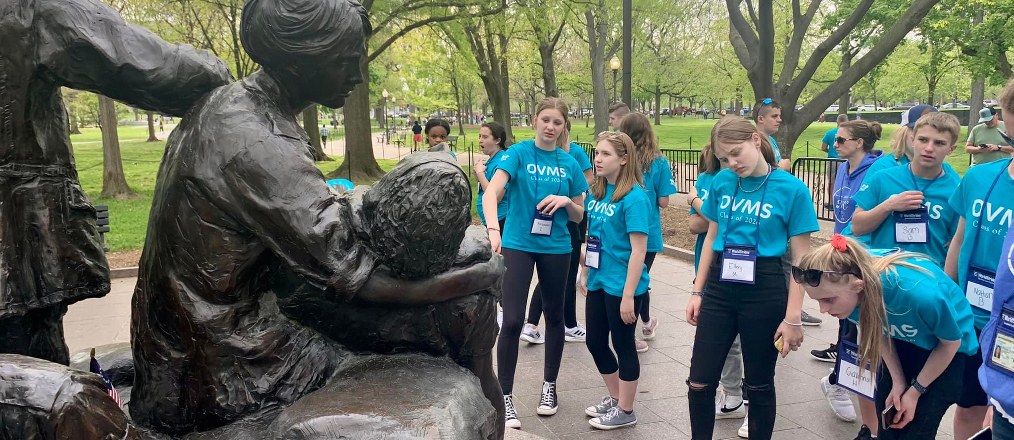 Girls looking at statue in Washington DC