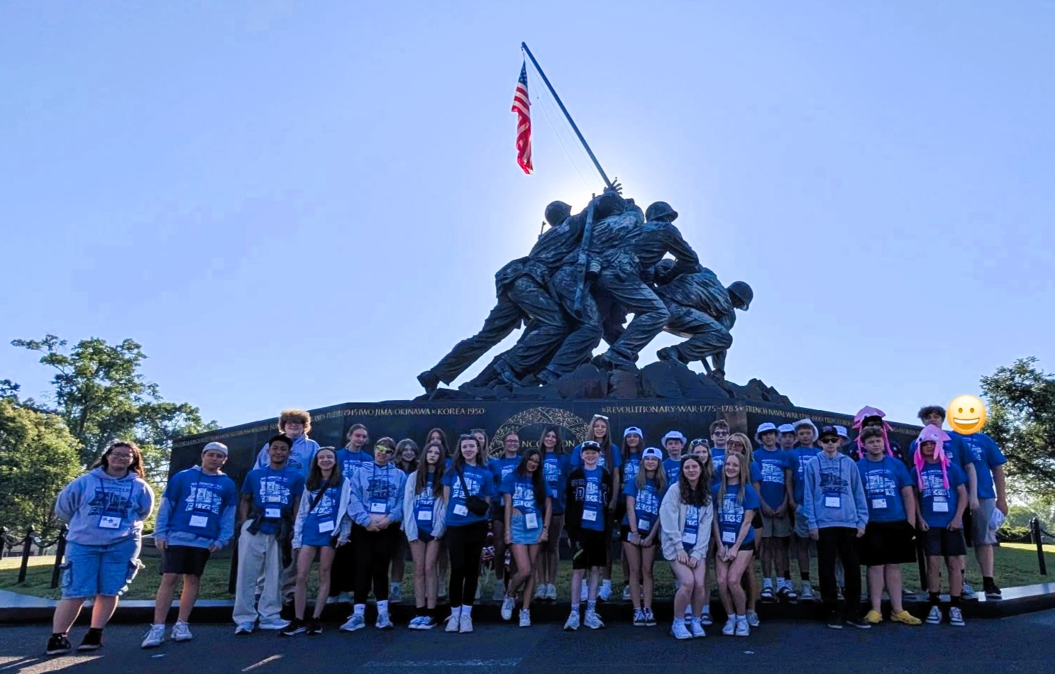 students posing by monument in DC