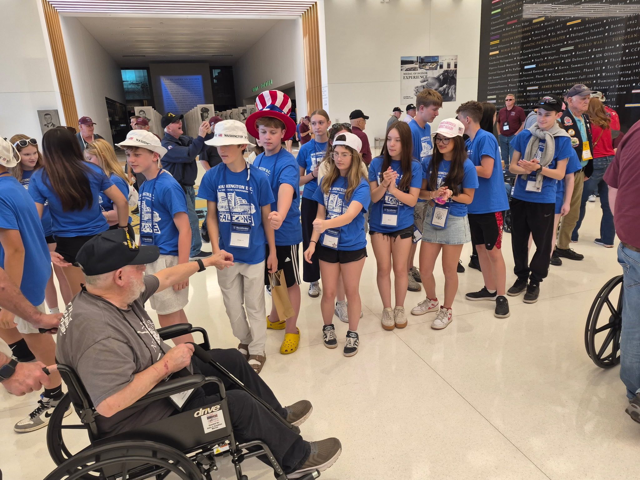 students in D.C. standing in building