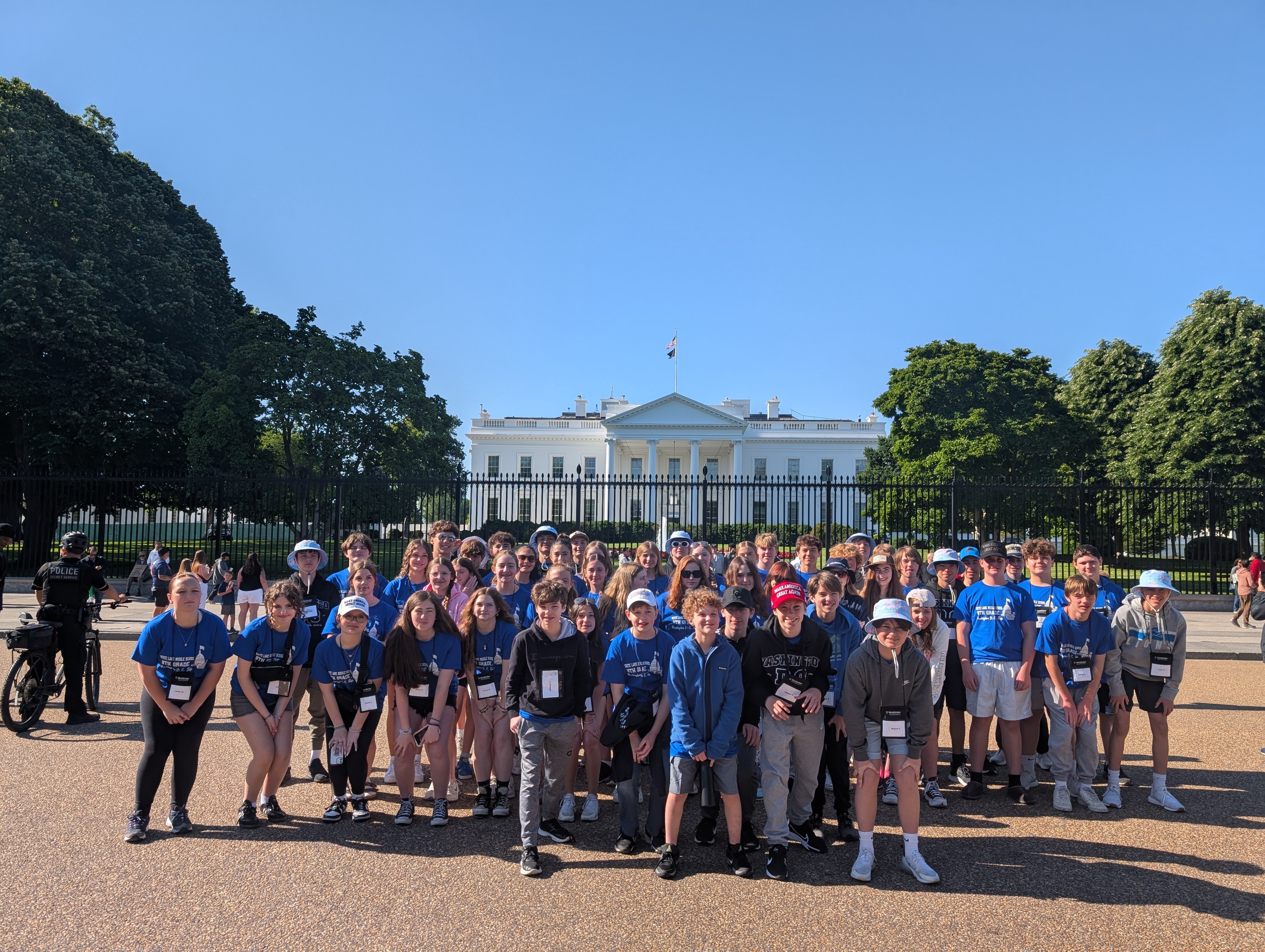 students pose for group photo outside in DC
