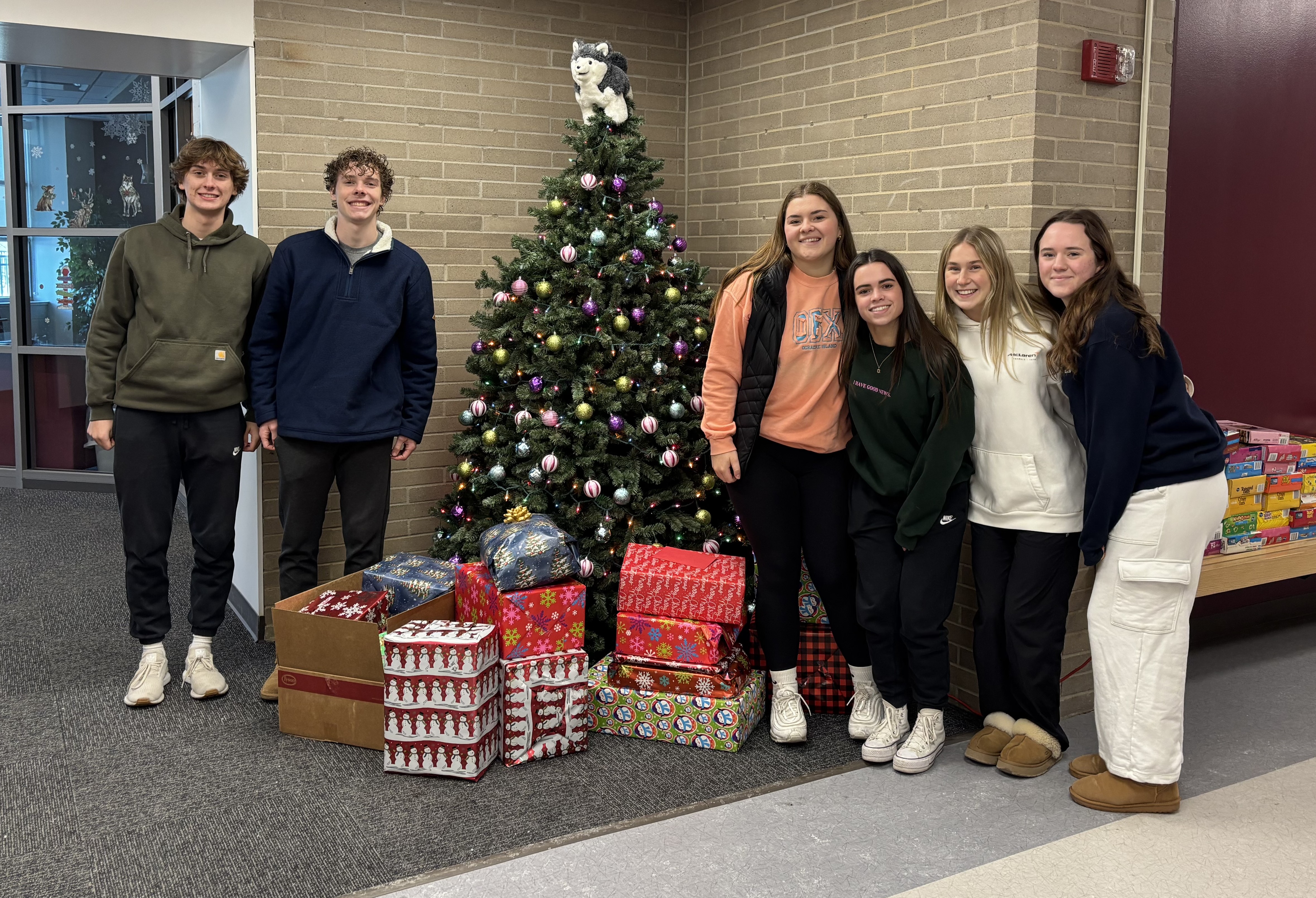 MHS students deliver gifts for Milford Miracles.