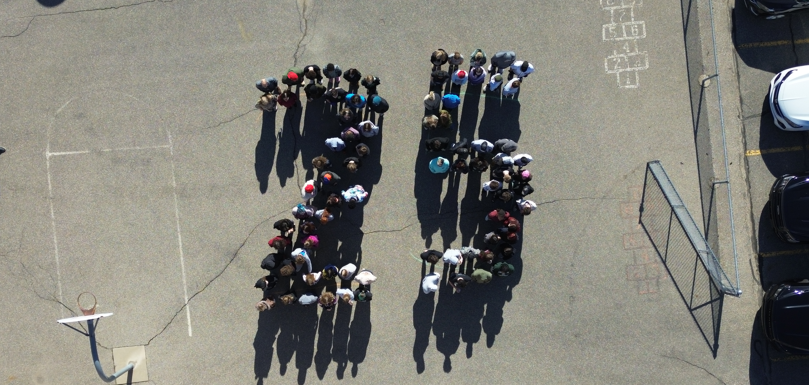 HHS Students form a "25" 