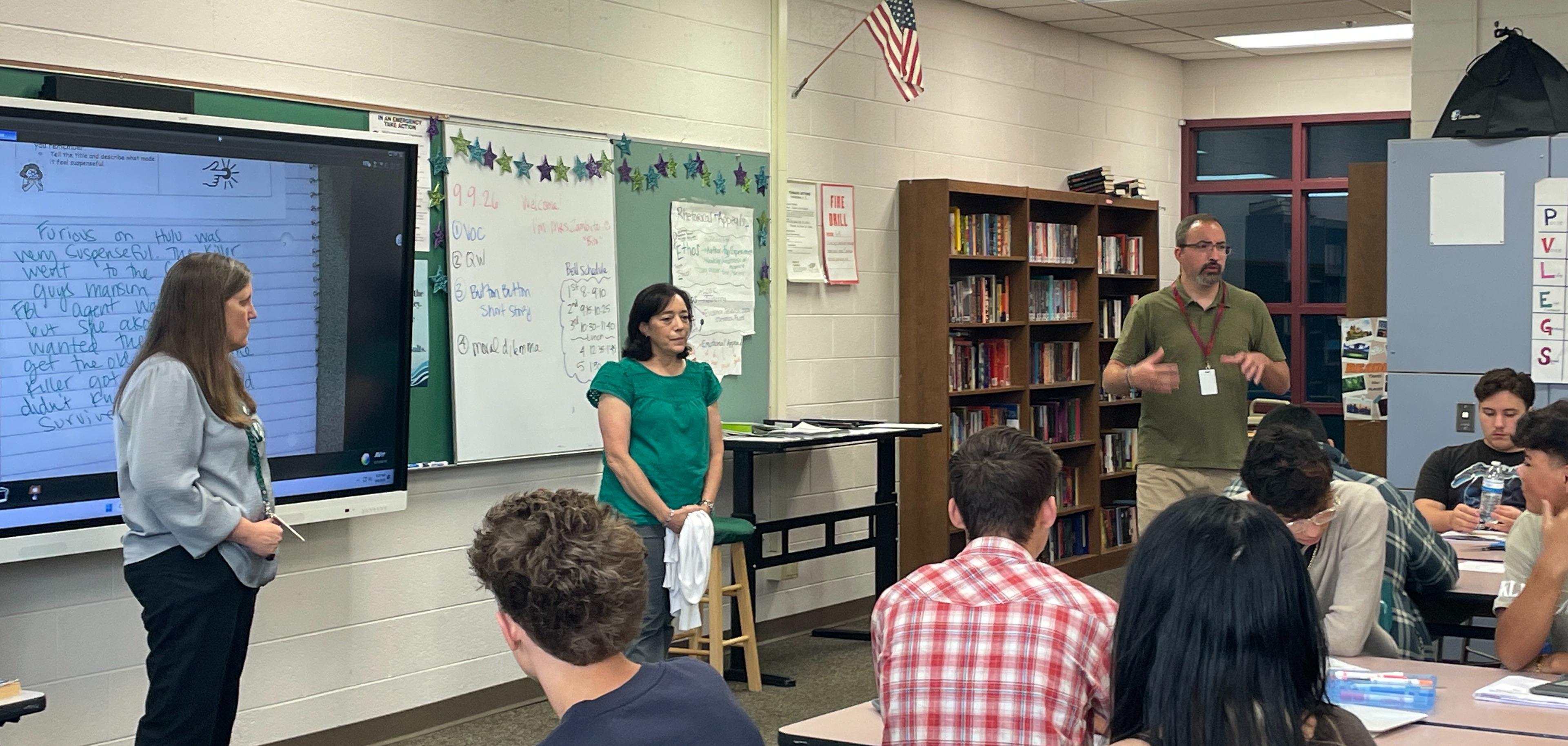 Harbor support staff and Mr. Dowker speak with a class