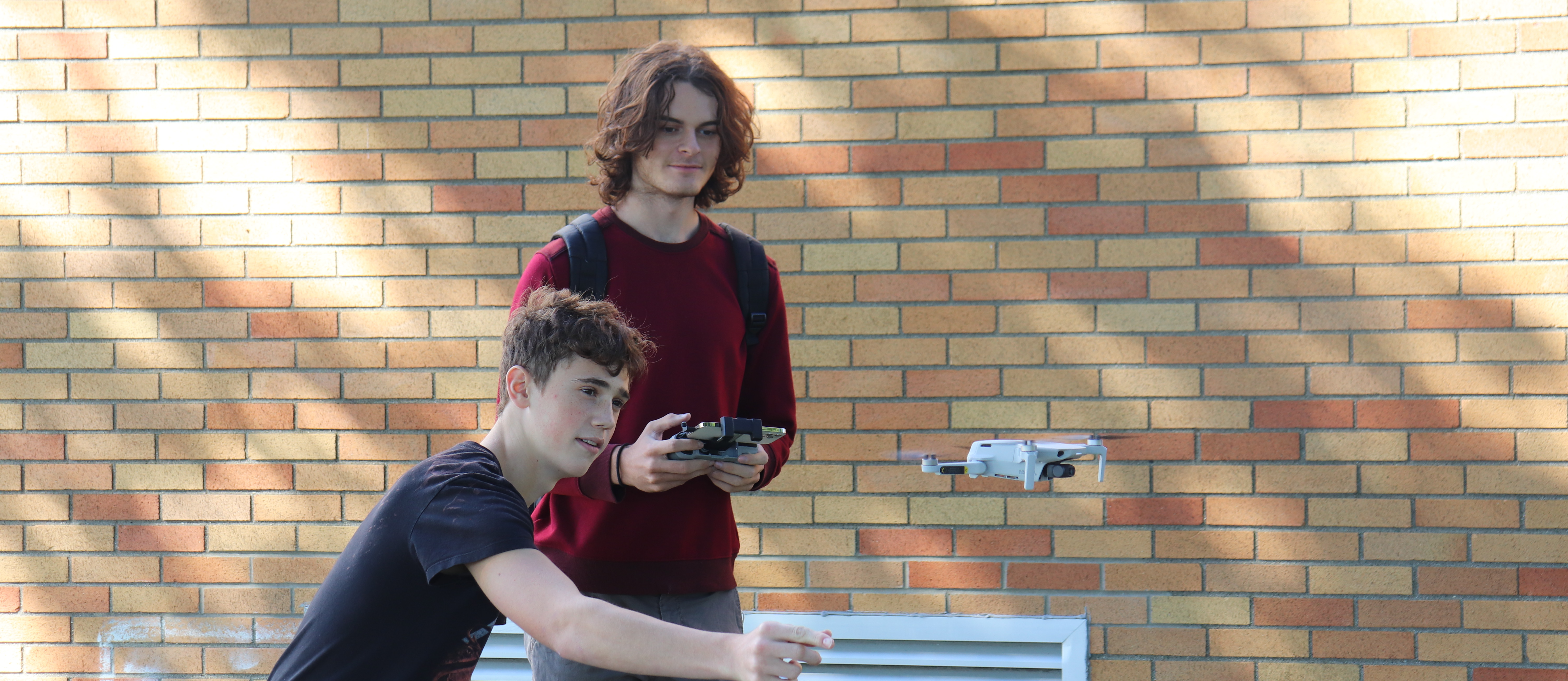 Harbor High students, Ivan and Dylan, utilize the school's drone for their video project.