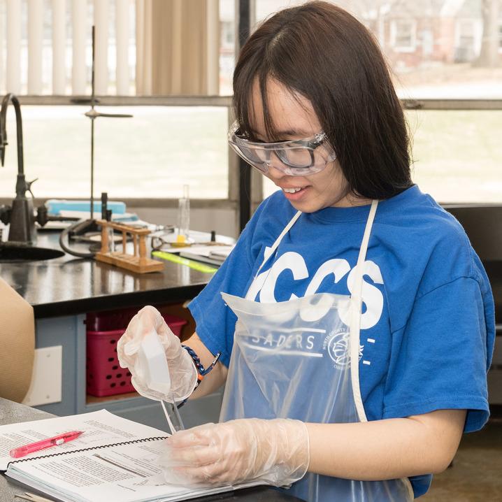 High school working with a chemistry set