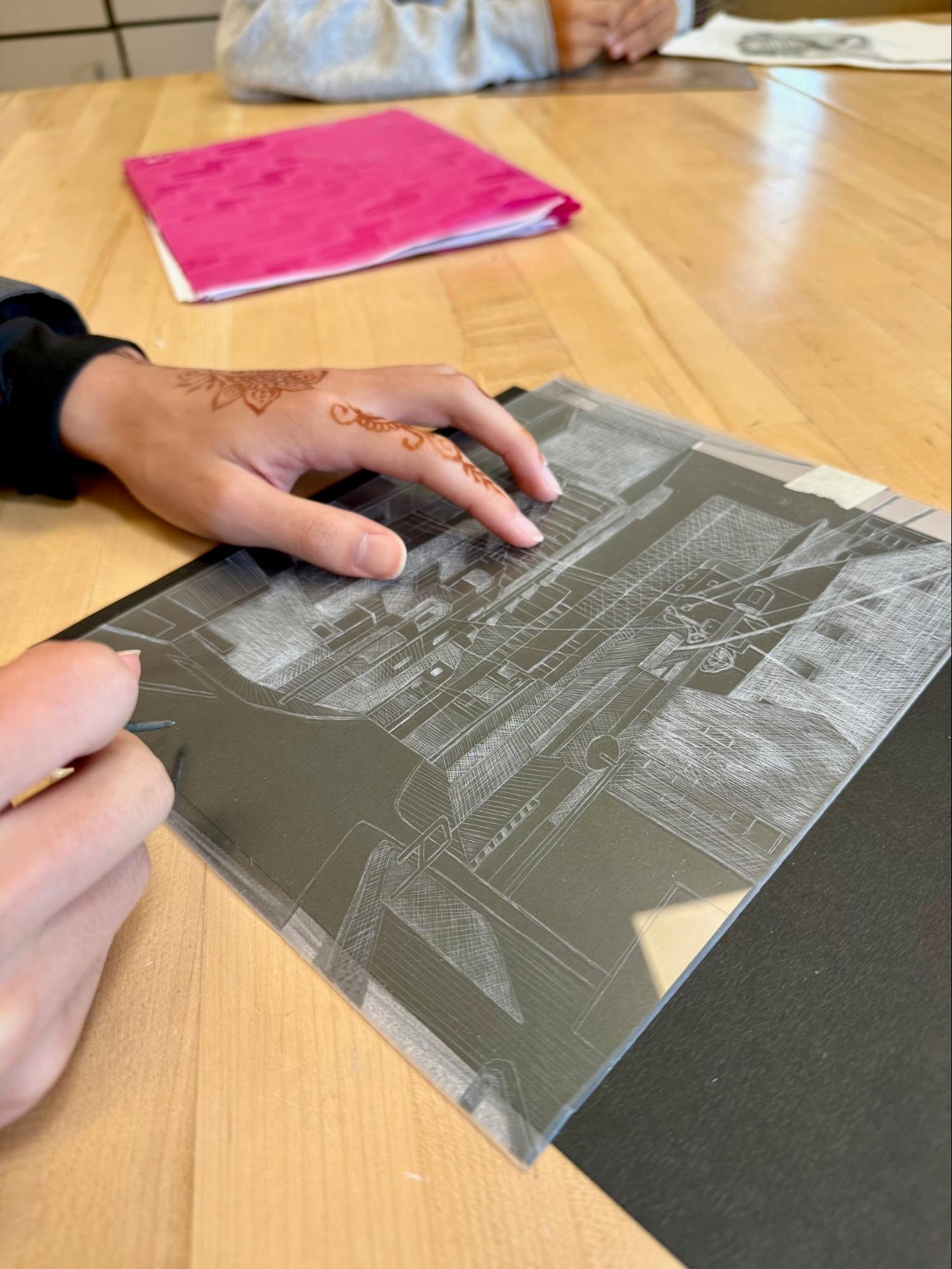 NCHS students using printing press to explore curiosity