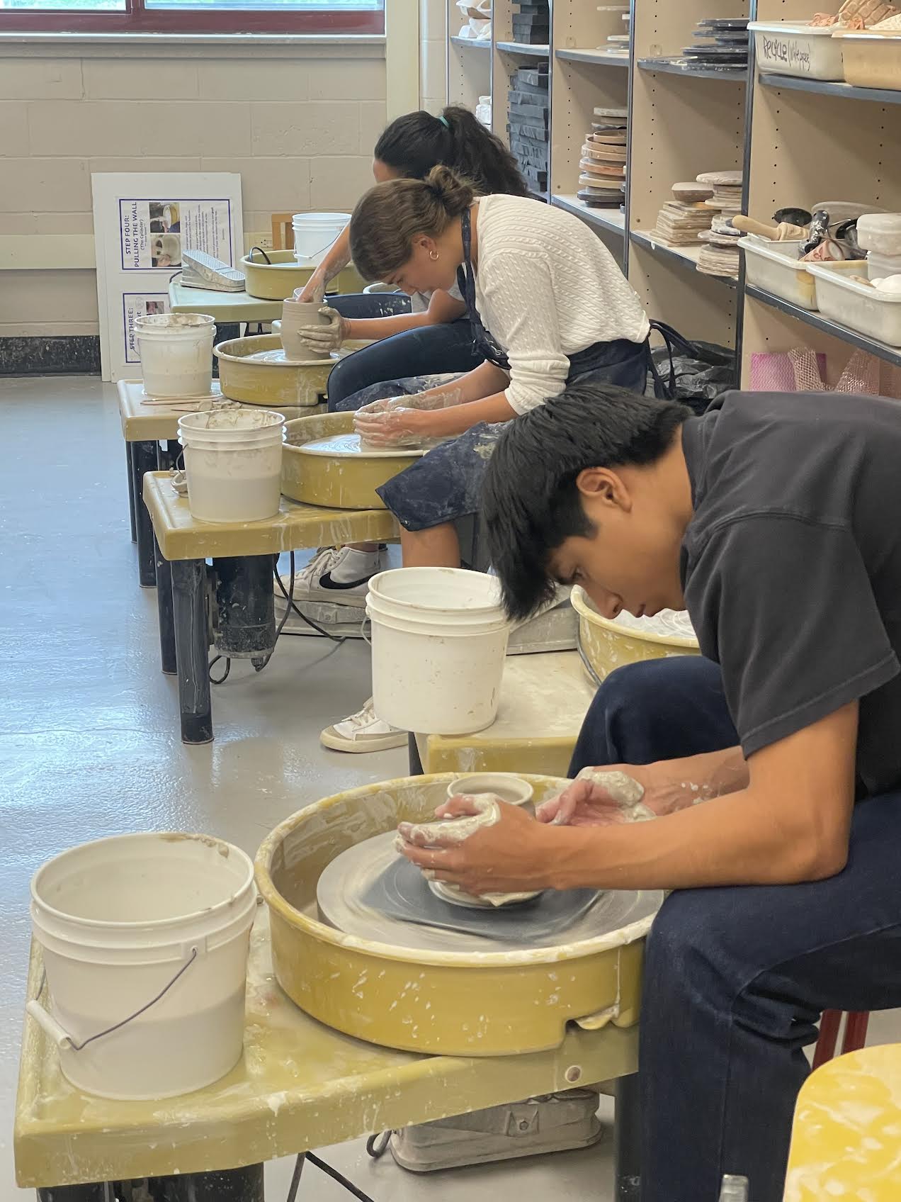 NCHS students utilizing clay wheels velop critical thinking skills