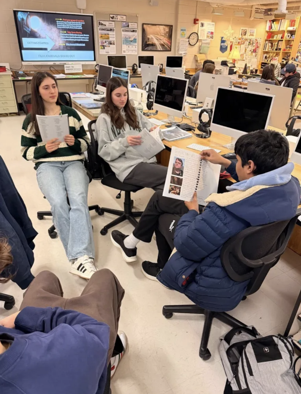 Students working together in film class