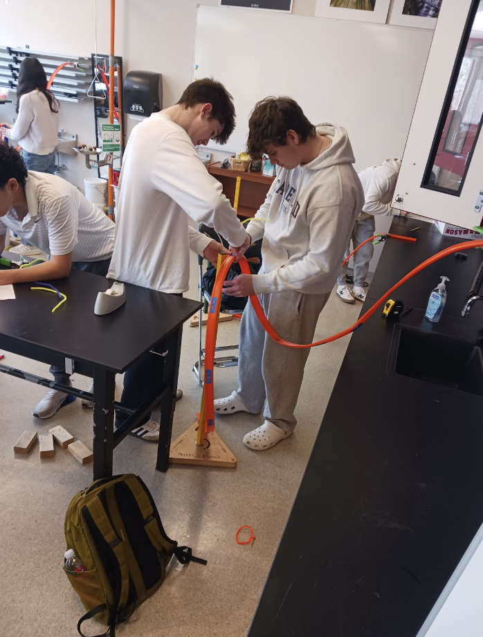 Physics students working on lab
