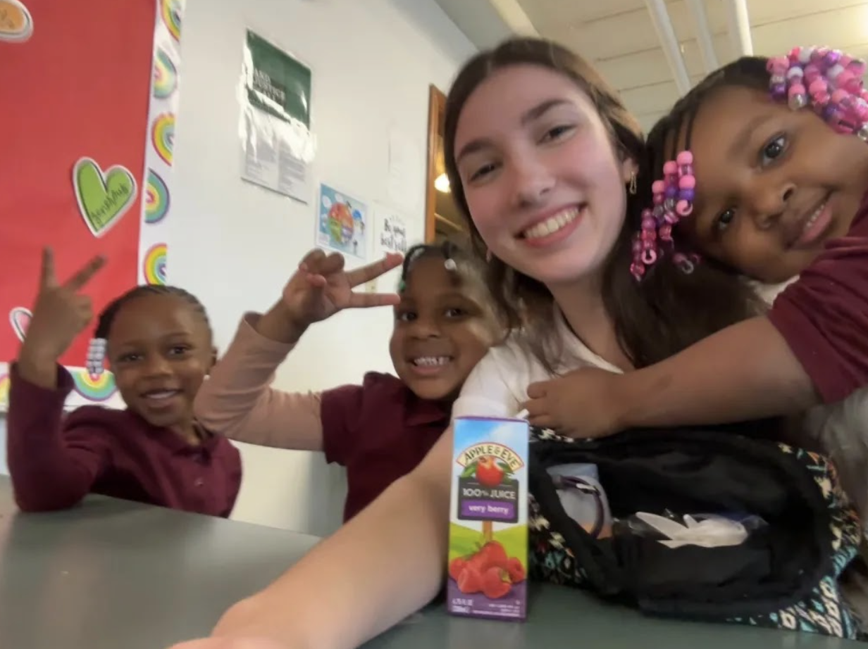 NHS student with the kids