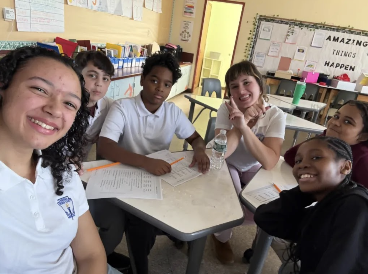 NHS student with the kids